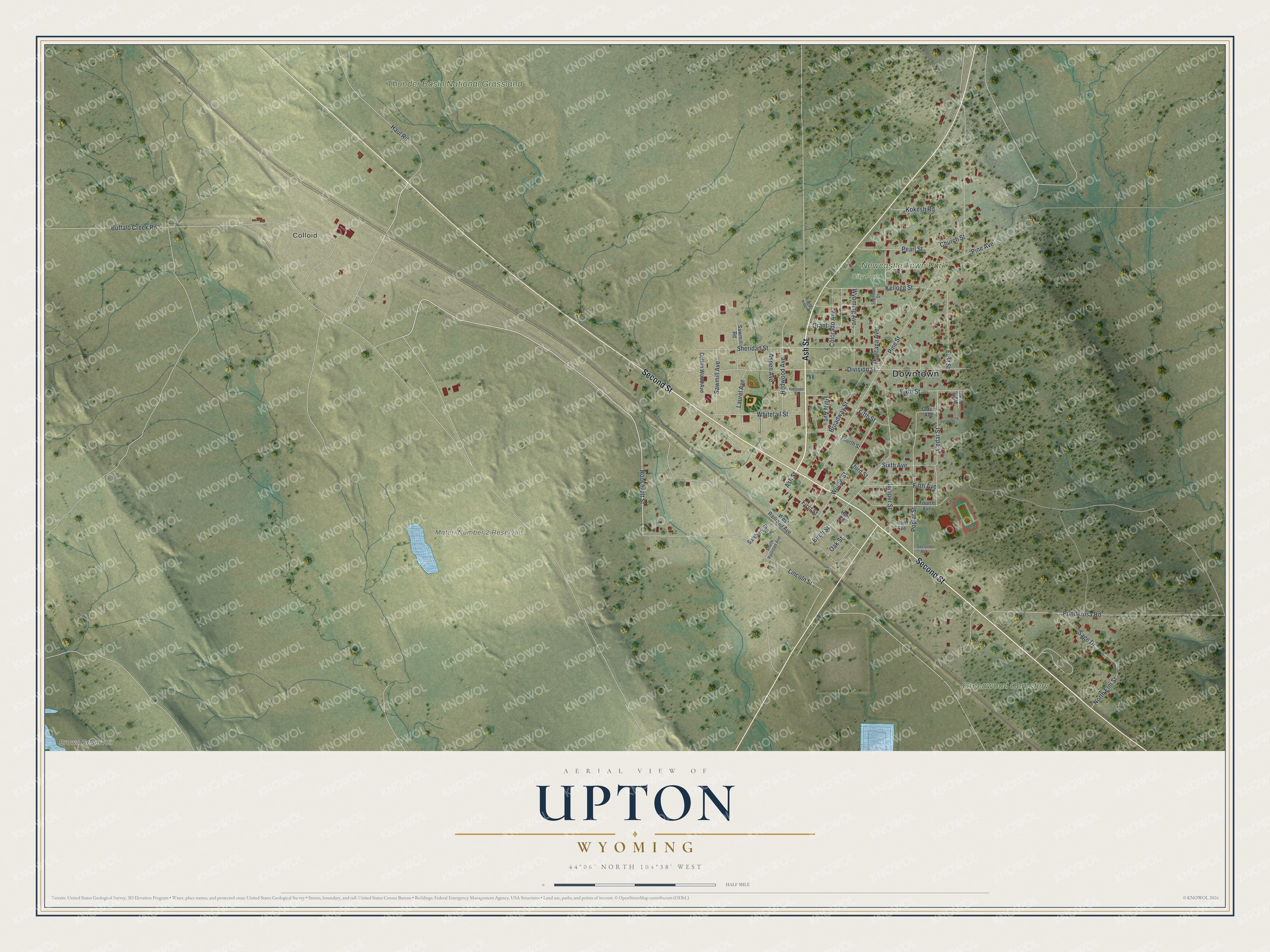 Full map of Upton, Wyoming, with red buildings, printed street names and the land around them