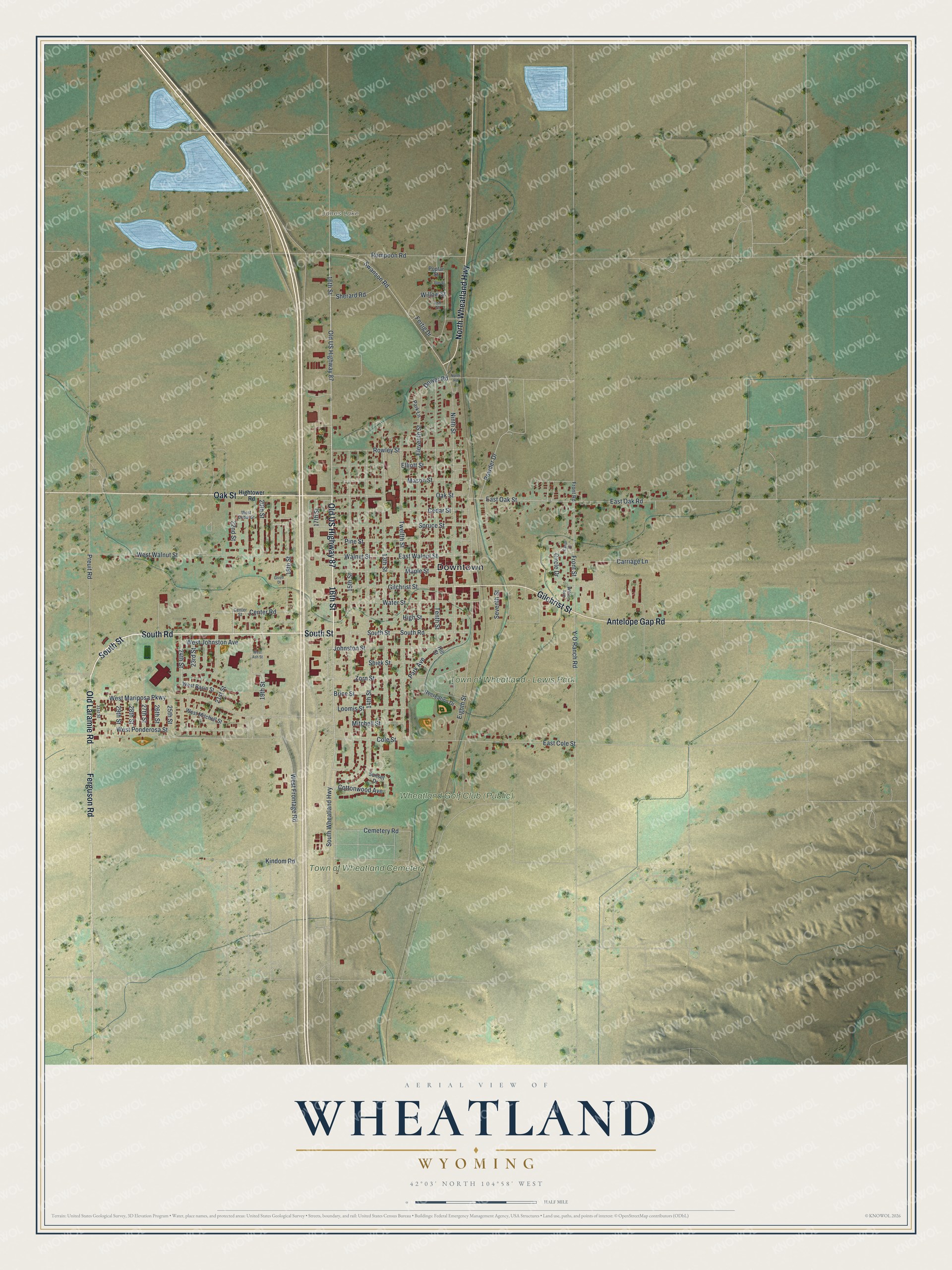 Full map of Wheatland, Wyoming, with red buildings, printed street names and the land around them