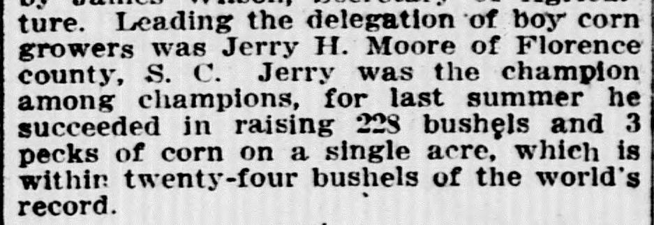 1911 newspaper paragraph saying Jerry H. Moore of Florence county led the boy corn growers and was the champion among champions