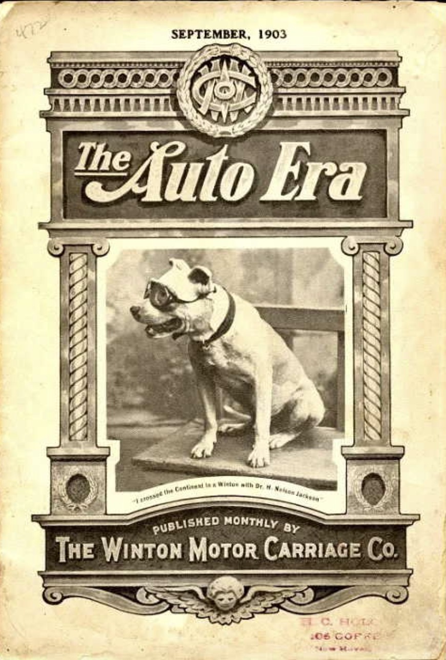 September 1903 cover of The Auto Era magazine showing Bud, a white bulldog wearing driving goggles and a collar, sitting on a bench, captioned I crossed the Continent in a Winton with Dr. H. Nelson Jackson