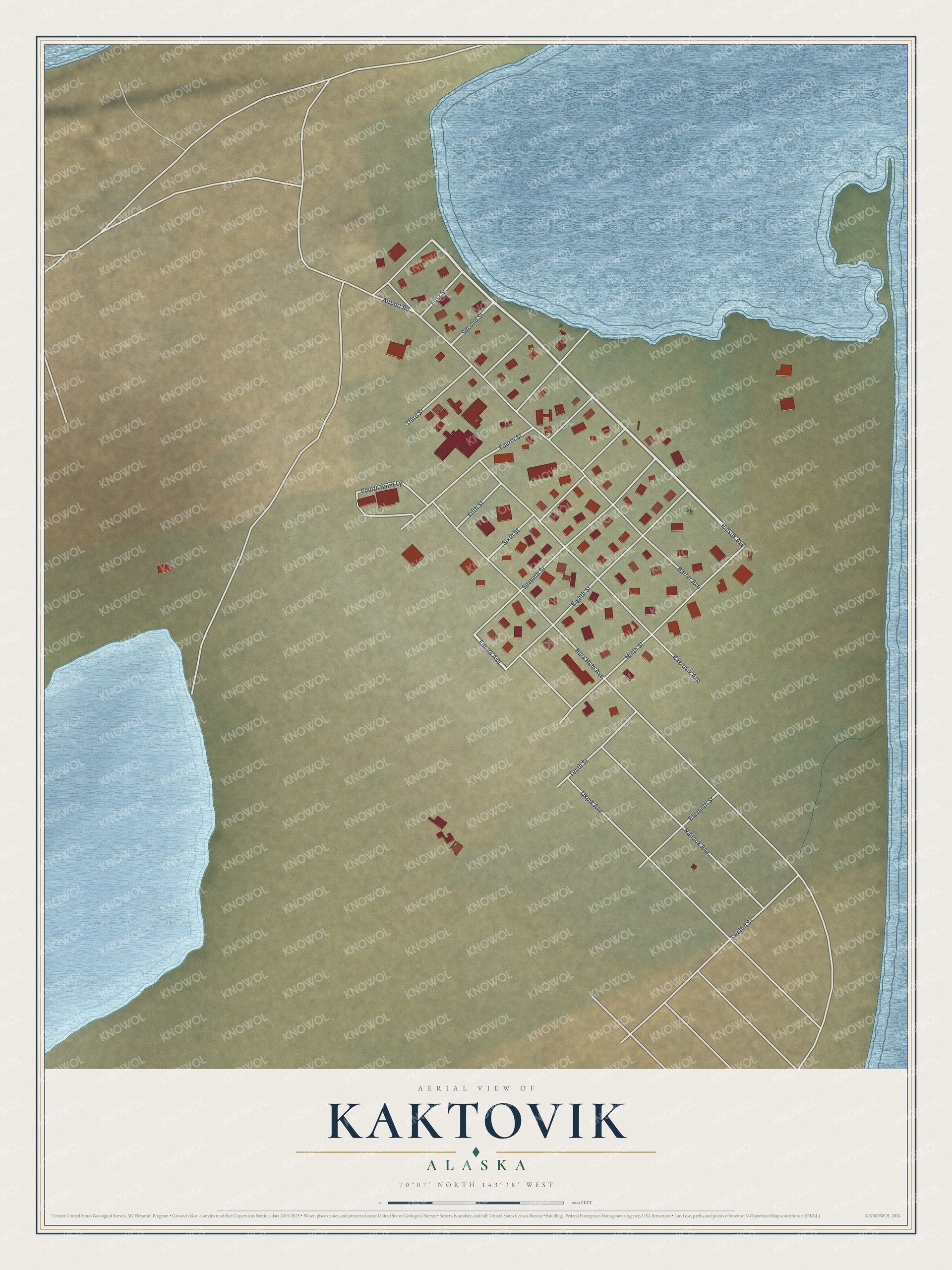 Full map of Kaktovik, Alaska, with red buildings, printed street names and the land around them