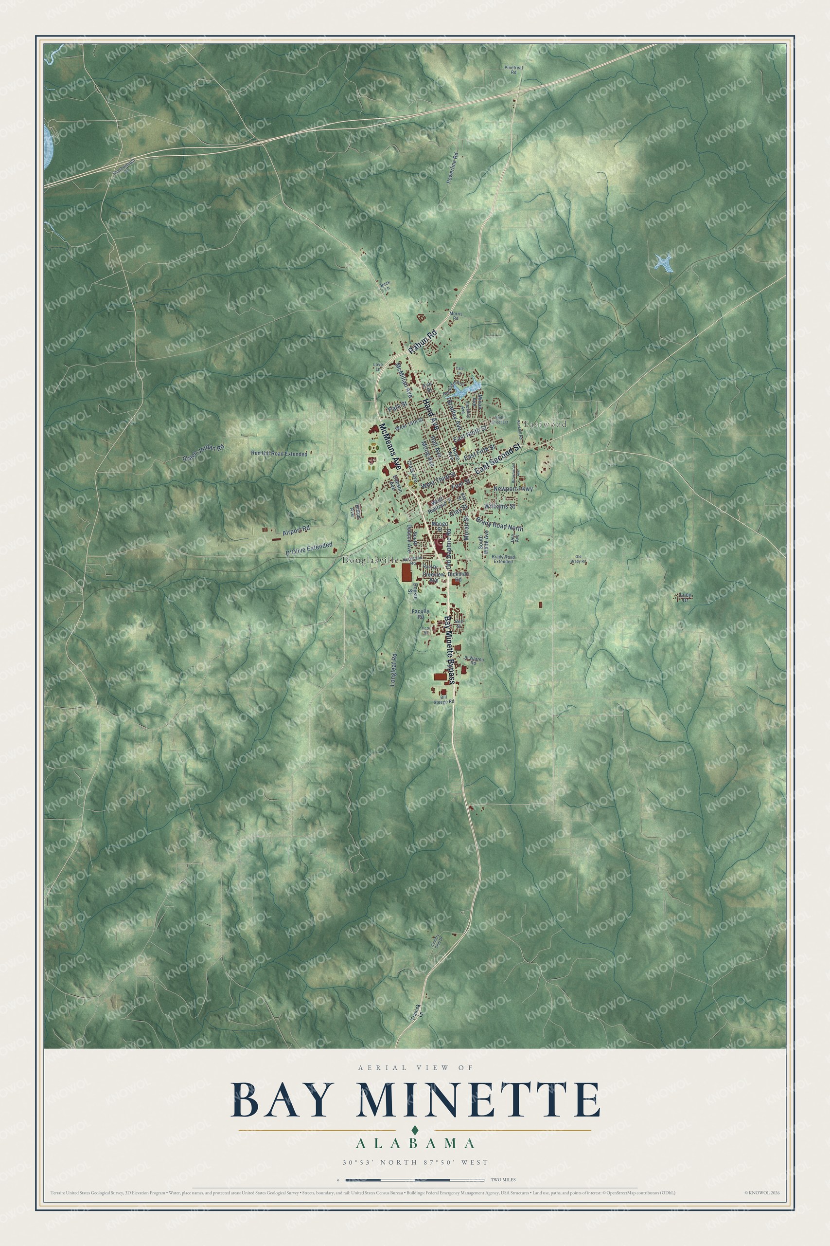 Full map of Bay Minette, Alabama, with red buildings, printed street names and the land around them