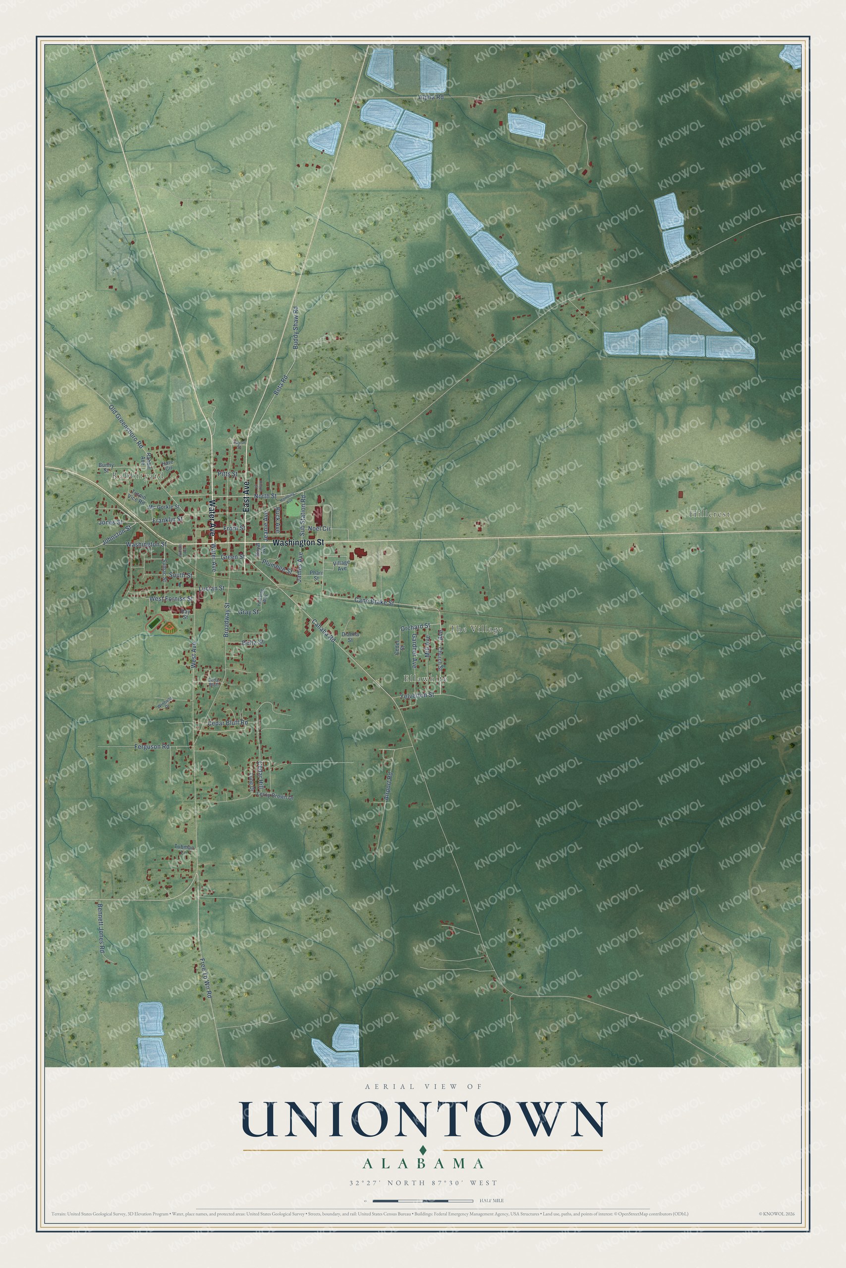 Full map of Uniontown, Alabama, with red buildings, printed street names and the land around them