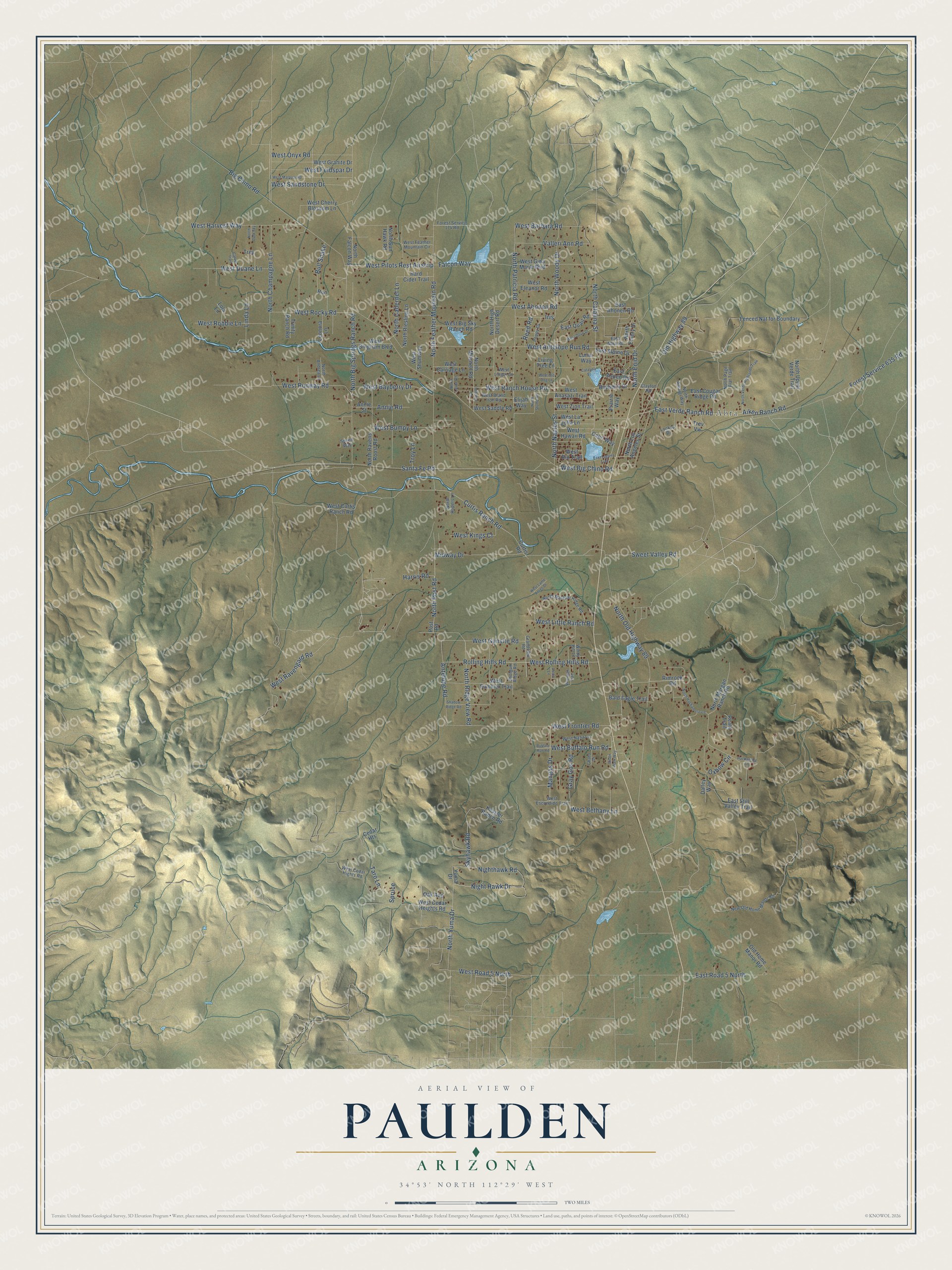 Full map of Paulden, Arizona, with red buildings, printed street names and the land around them