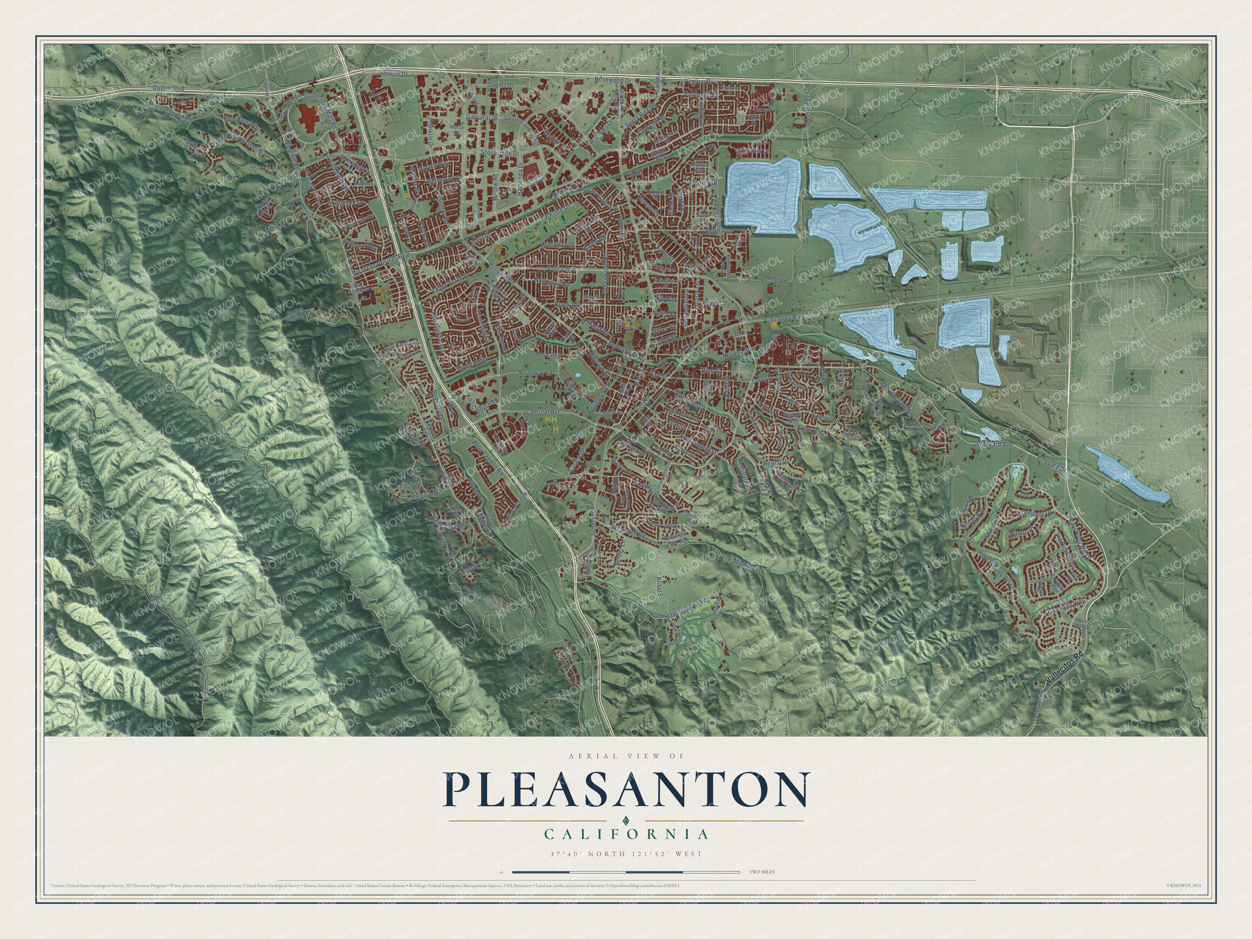 Full map of Pleasanton, California, with red buildings, printed street names and the land around them