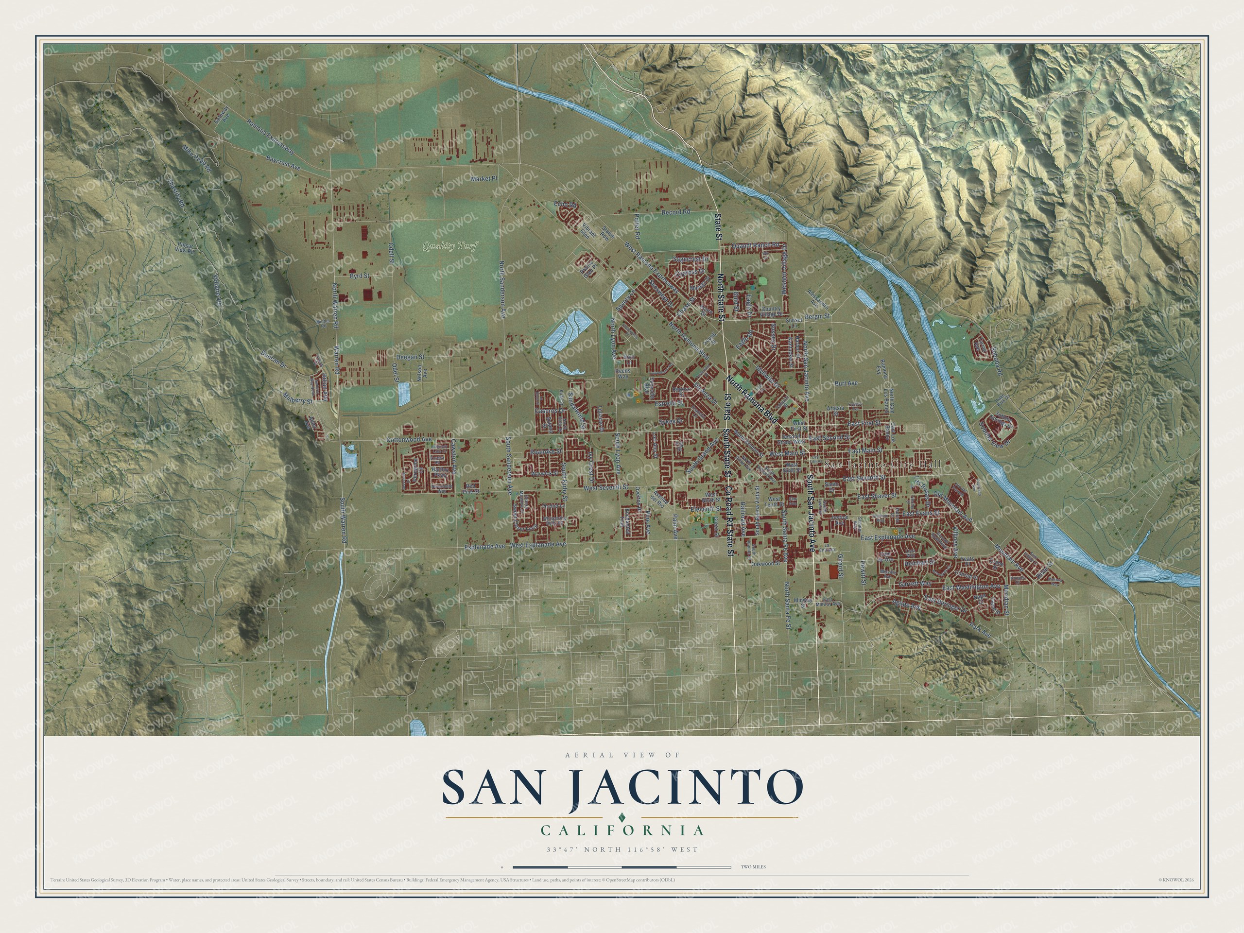 Full map of San Jacinto, California, with red buildings, printed street names and the land around them
