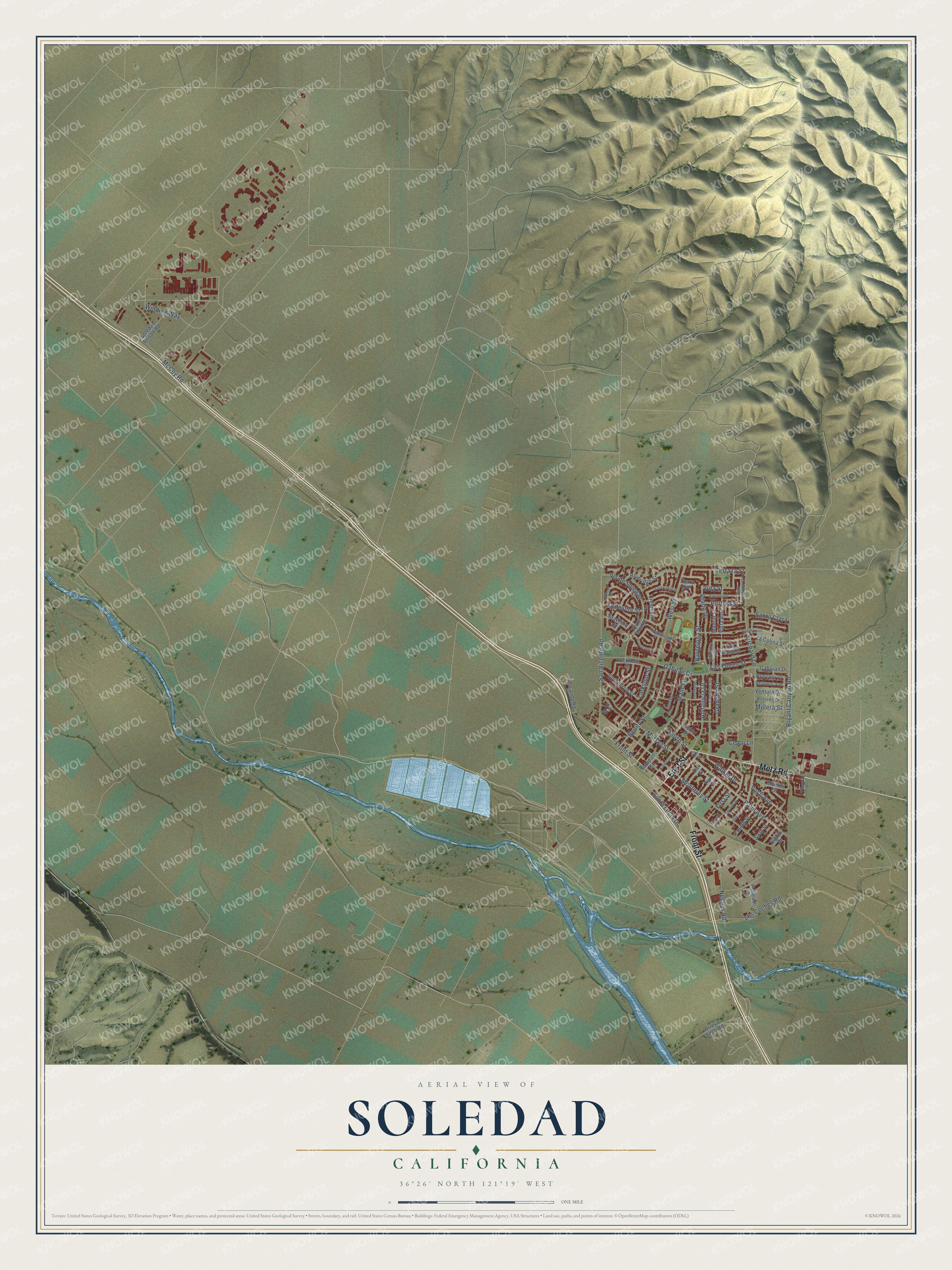 Full map of Soledad, California, with red buildings, printed street names and the land around them