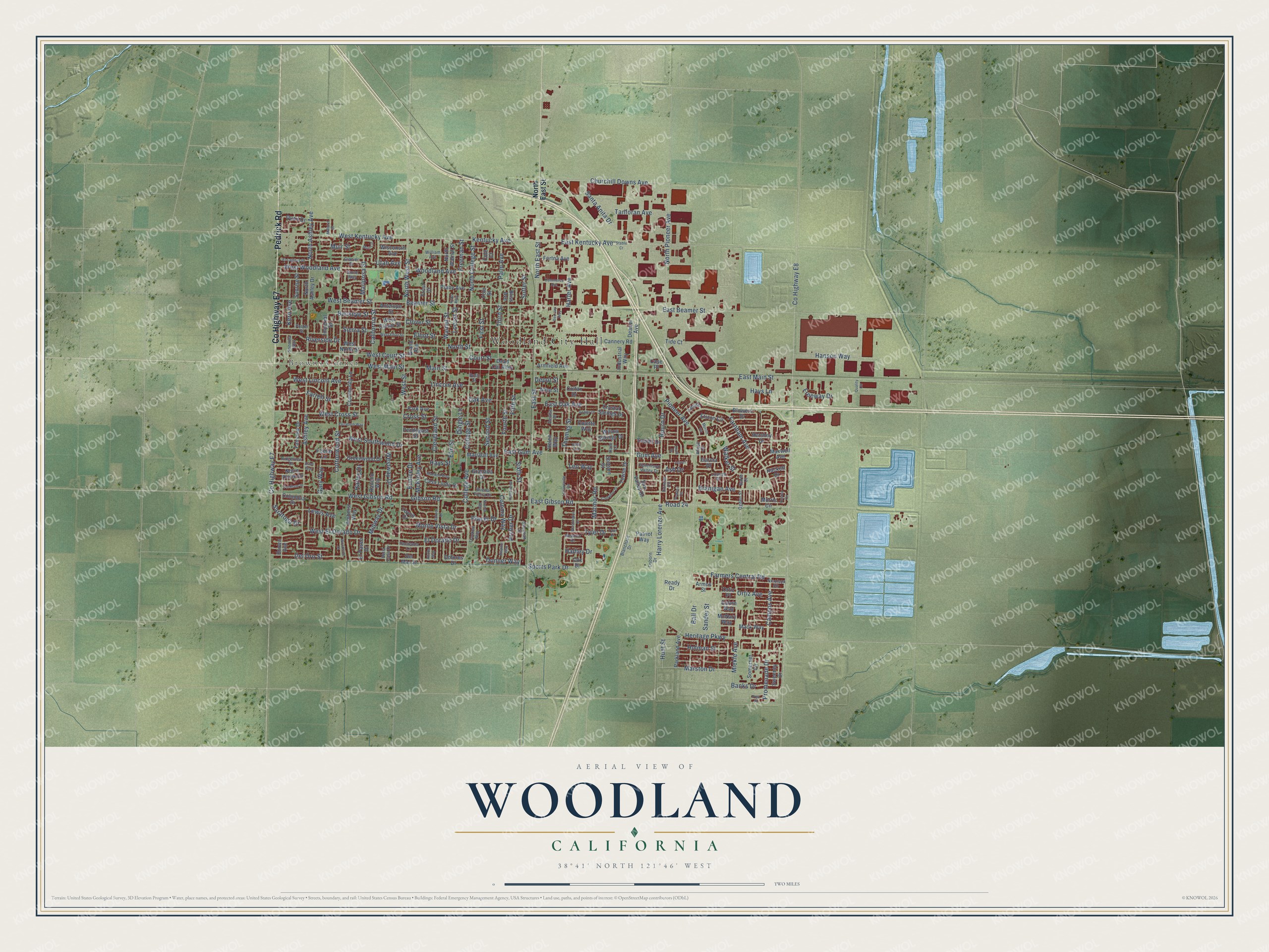 Full map of Woodland, California, with red buildings, printed street names and the land around them