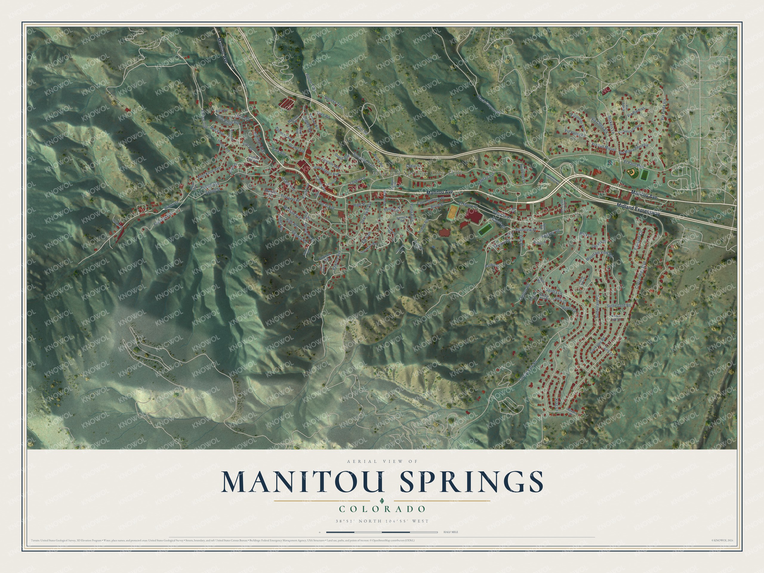 Full map of Manitou Springs, Colorado, with red buildings, printed street names and the land around them