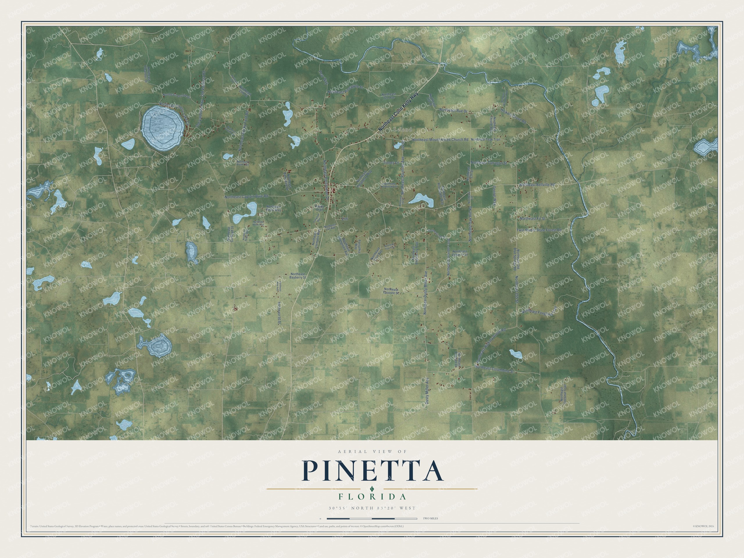 Full map of Pinetta, Florida, with red buildings, printed street names and the land around them
