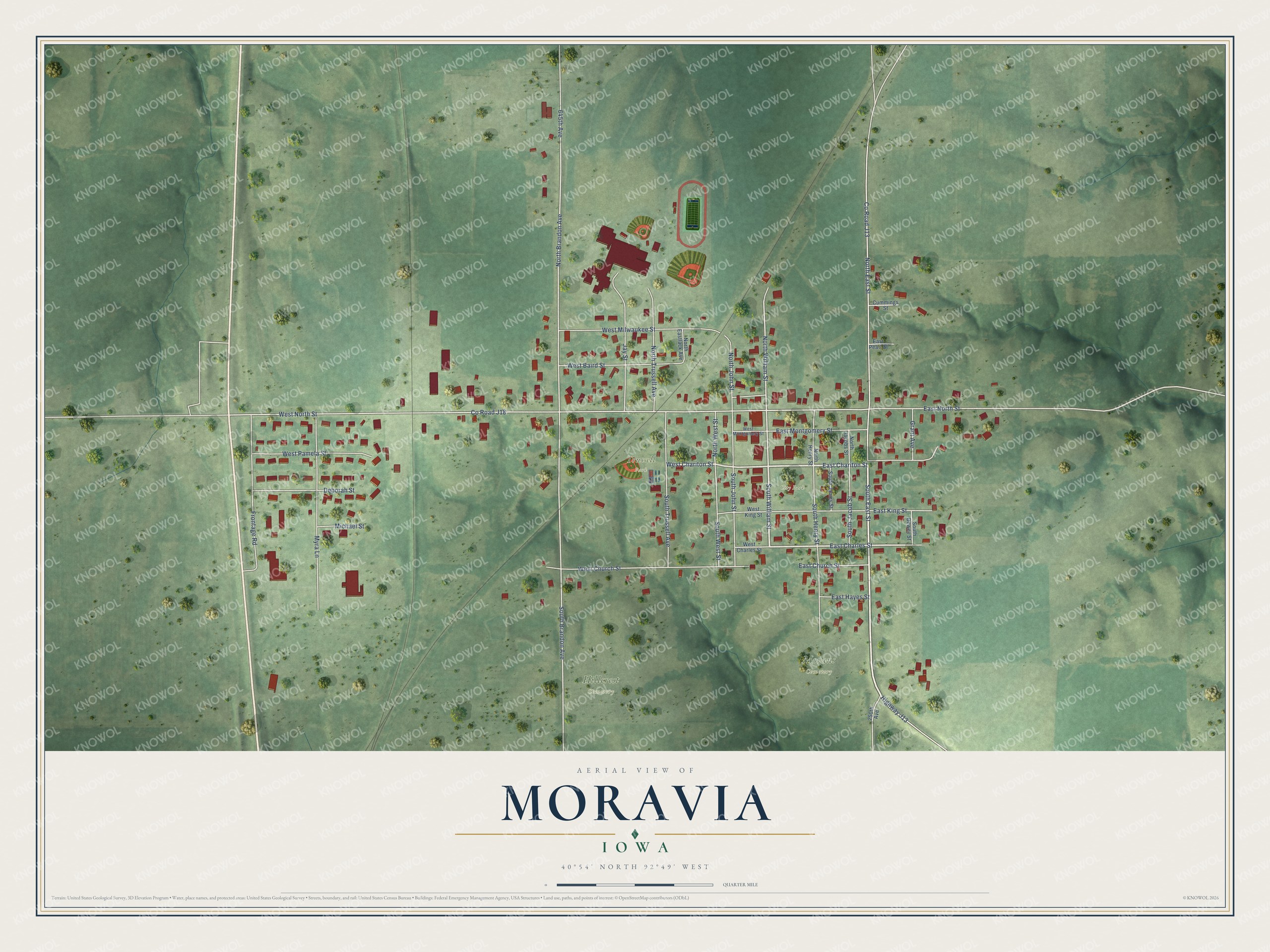 Full map of Moravia, Iowa, with red buildings, printed street names and the land around them