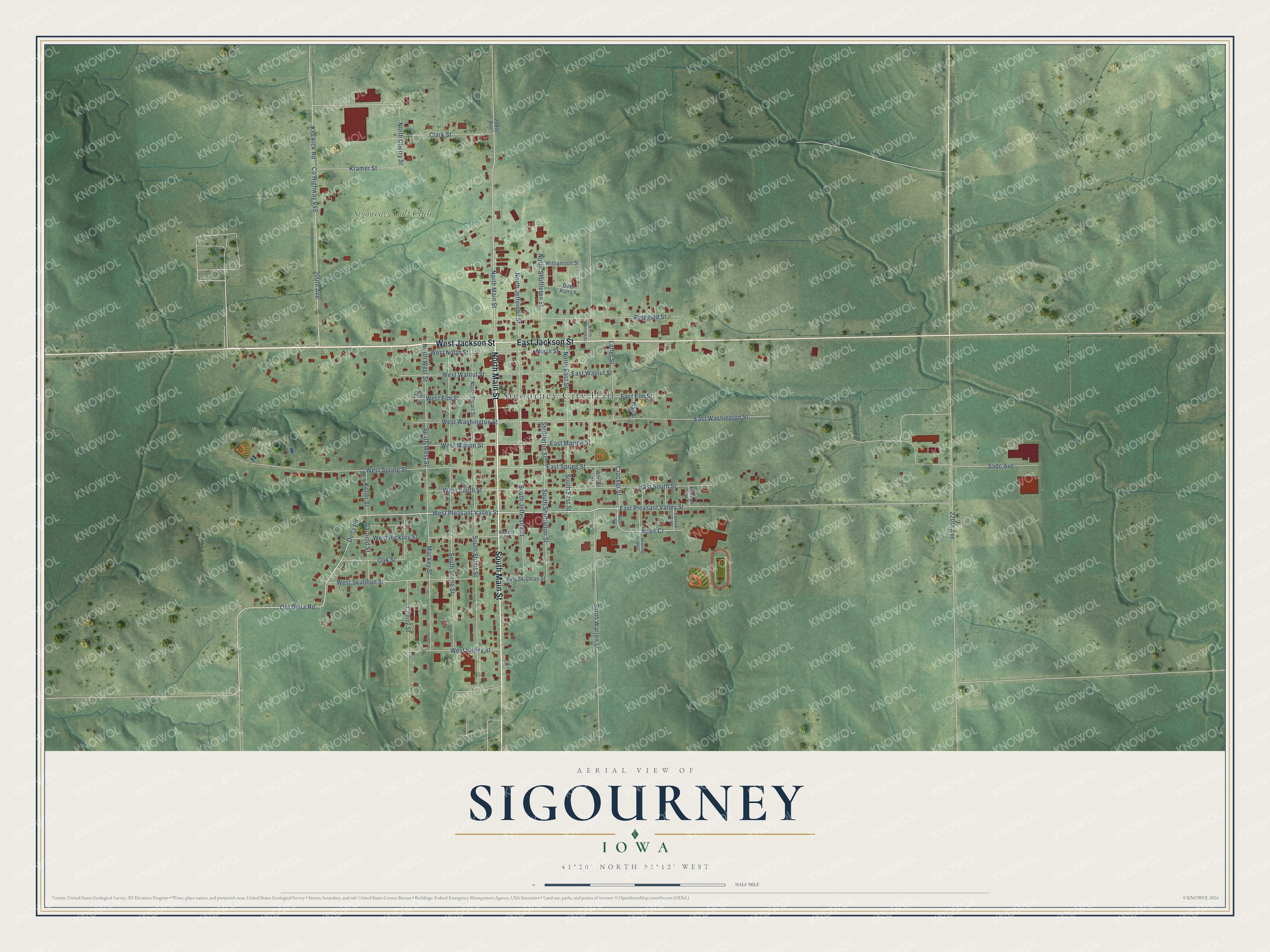 Full map of Sigourney, Iowa, with red buildings, printed street names and the land around them