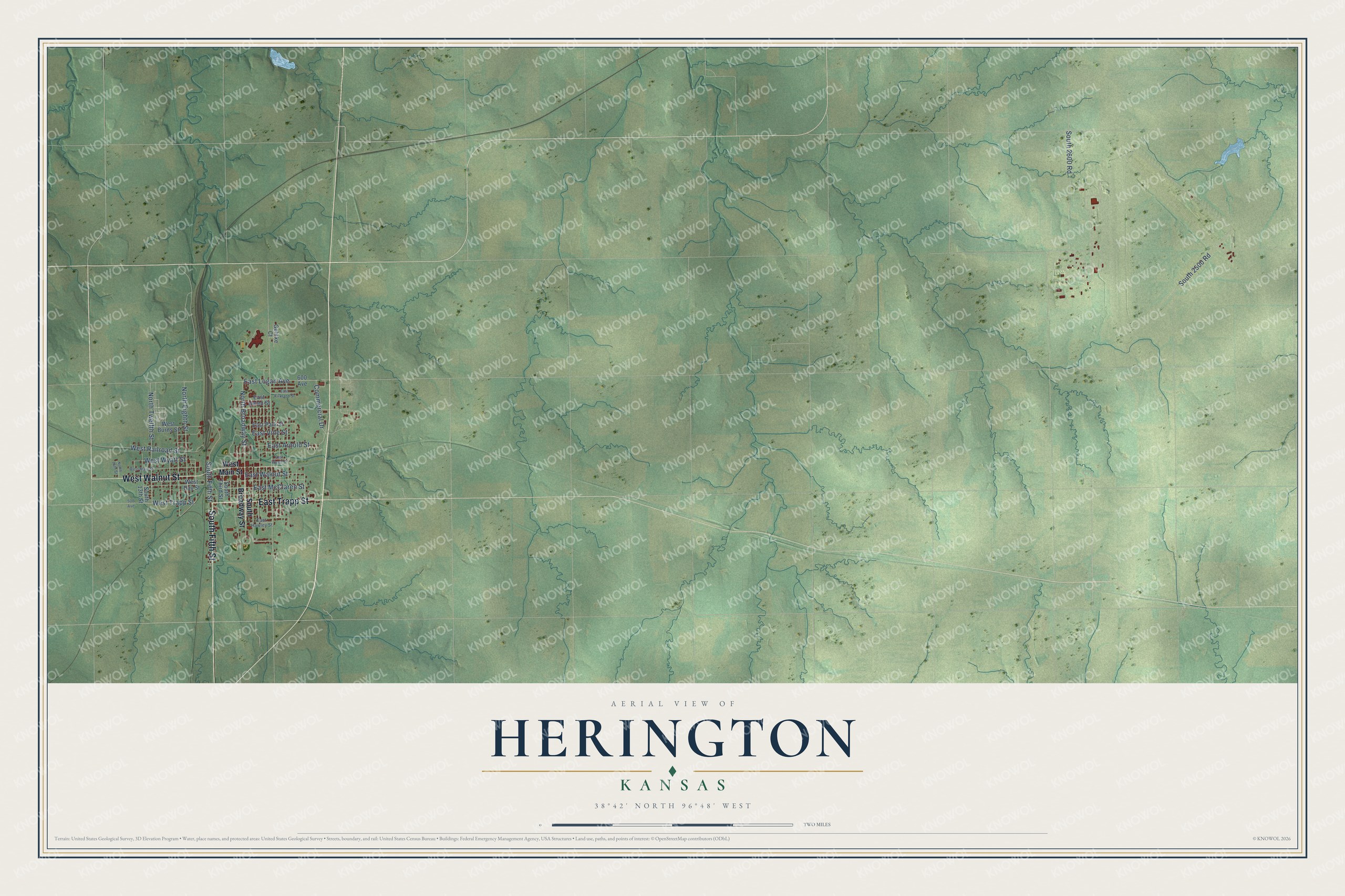 Full map of Herington, Kansas, with red buildings, printed street names and the land around them