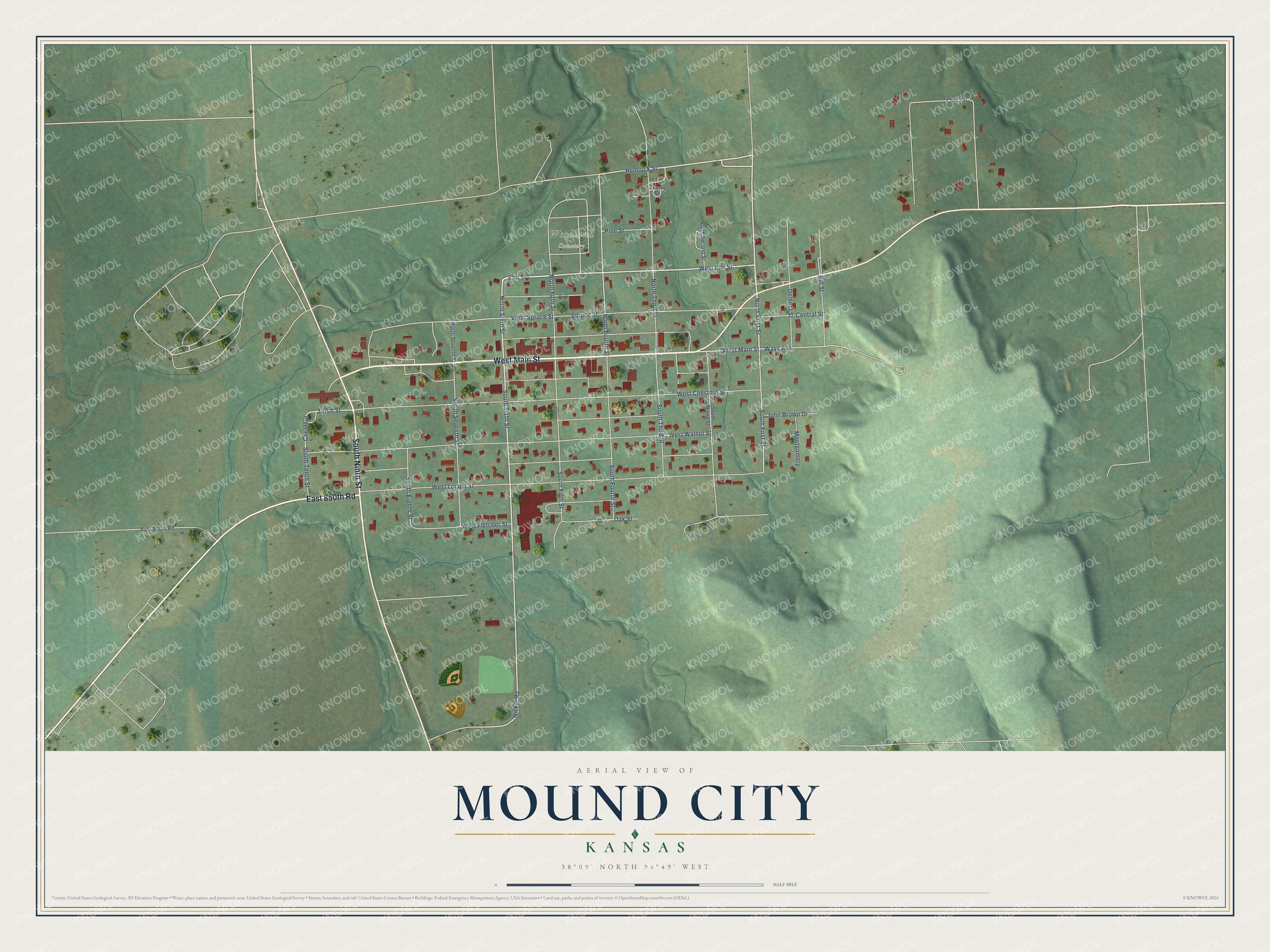 Full map of Mound City, Kansas, with red buildings, printed street names and the land around them