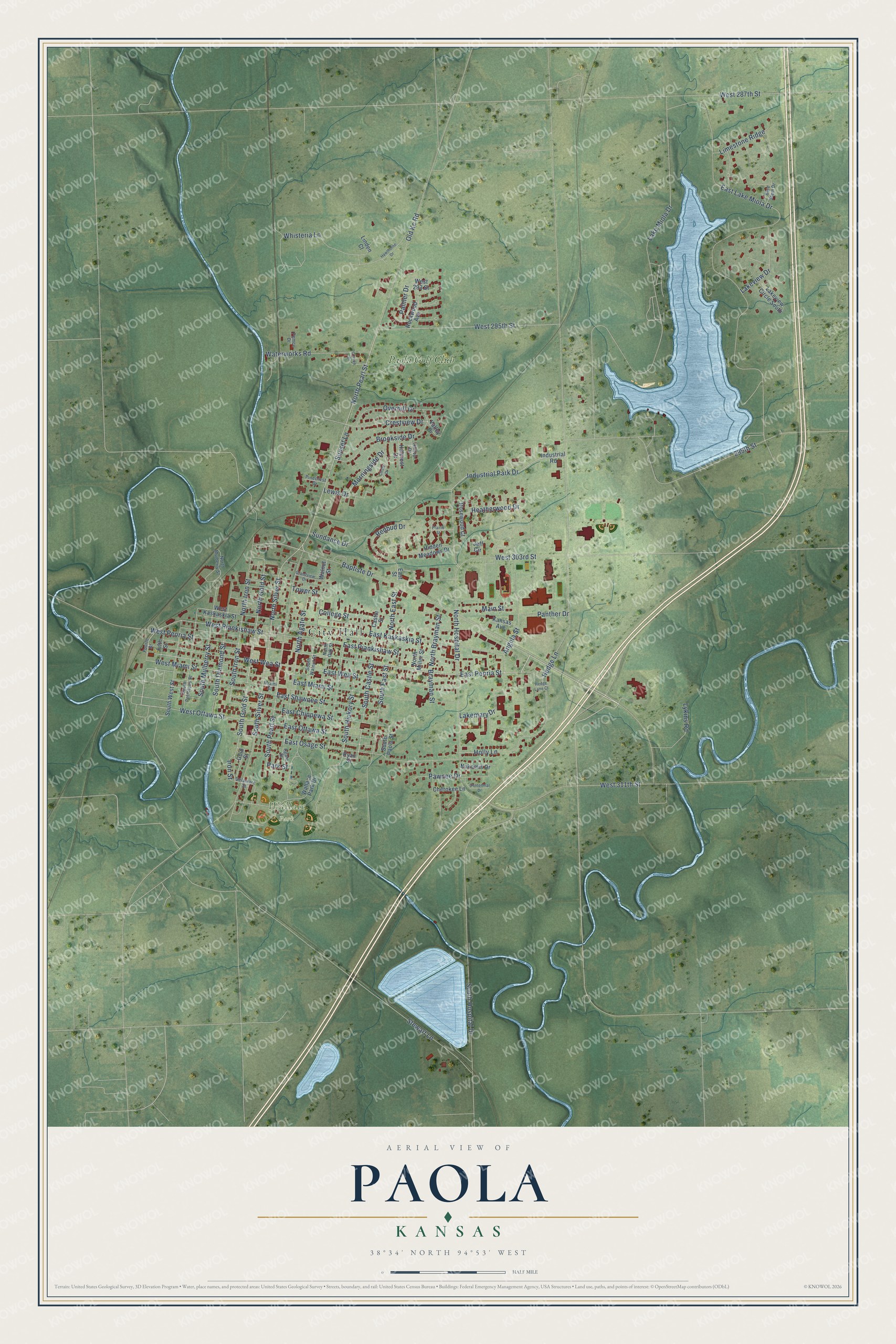 Full map of Paola, Kansas, with red buildings, printed street names and the land around them