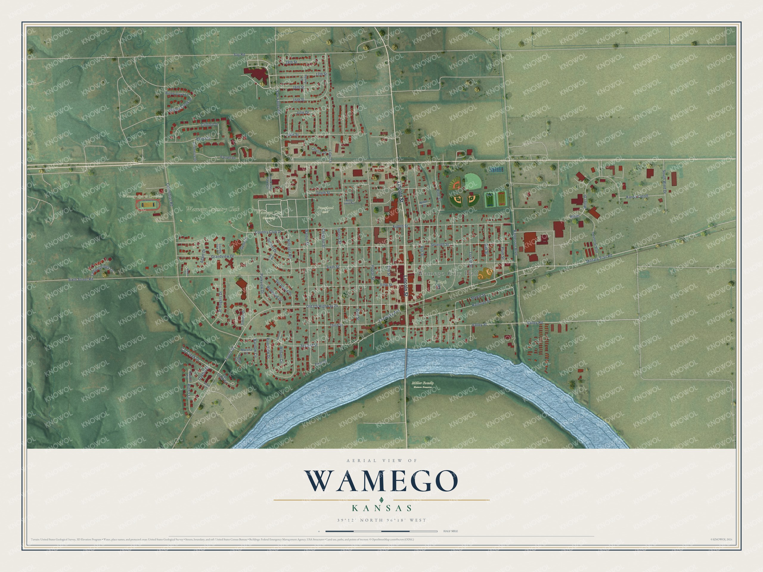 Full map of Wamego, Kansas, with red buildings, printed street names and the land around them