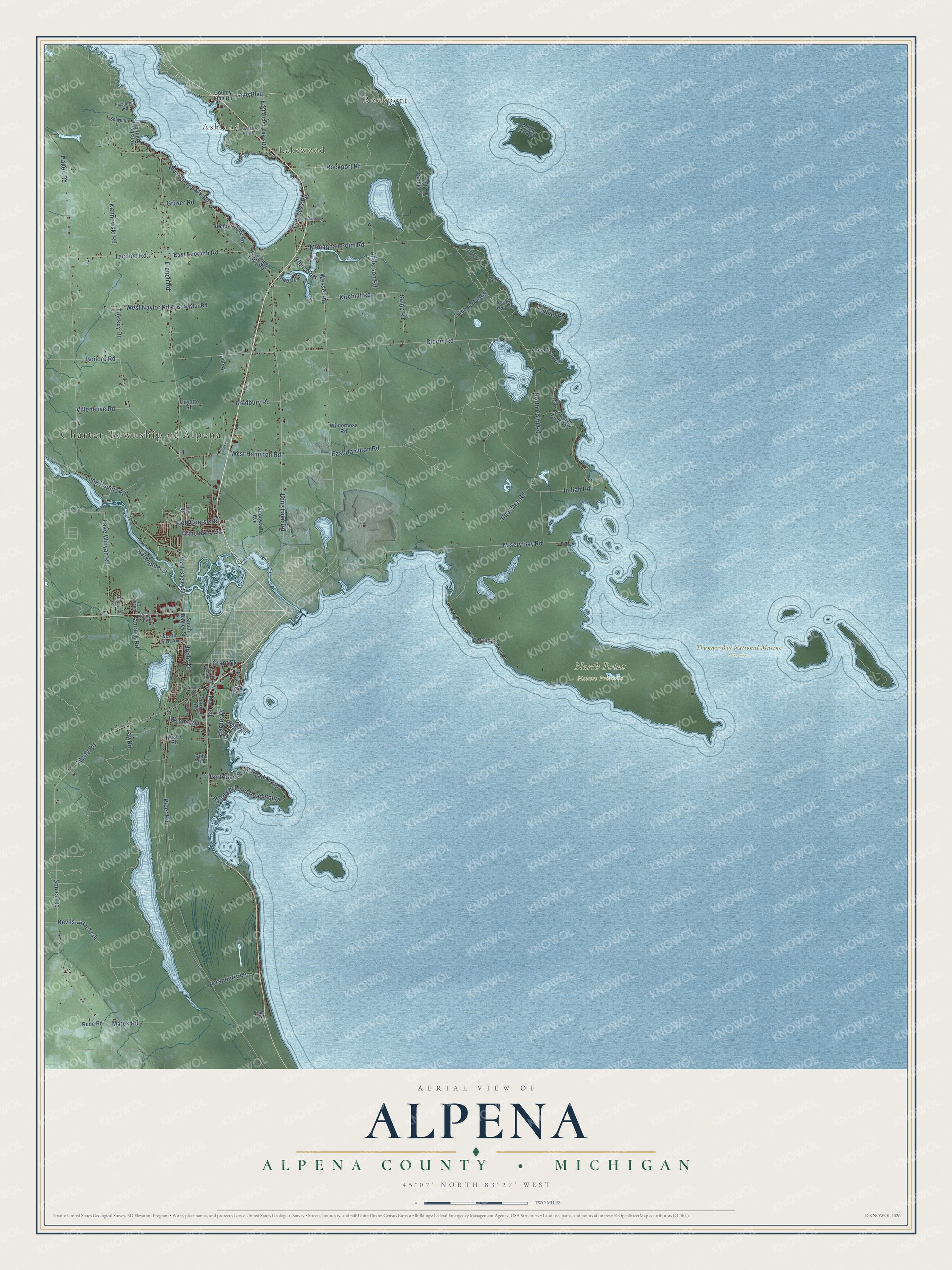 Full map of Alpena, Michigan, with red buildings, printed street names and the land around them