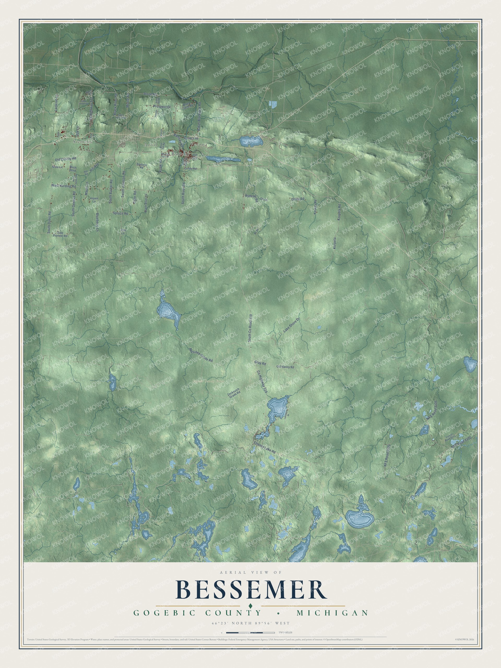 Full map of Bessemer, Michigan, with red buildings, printed street names and the land around them