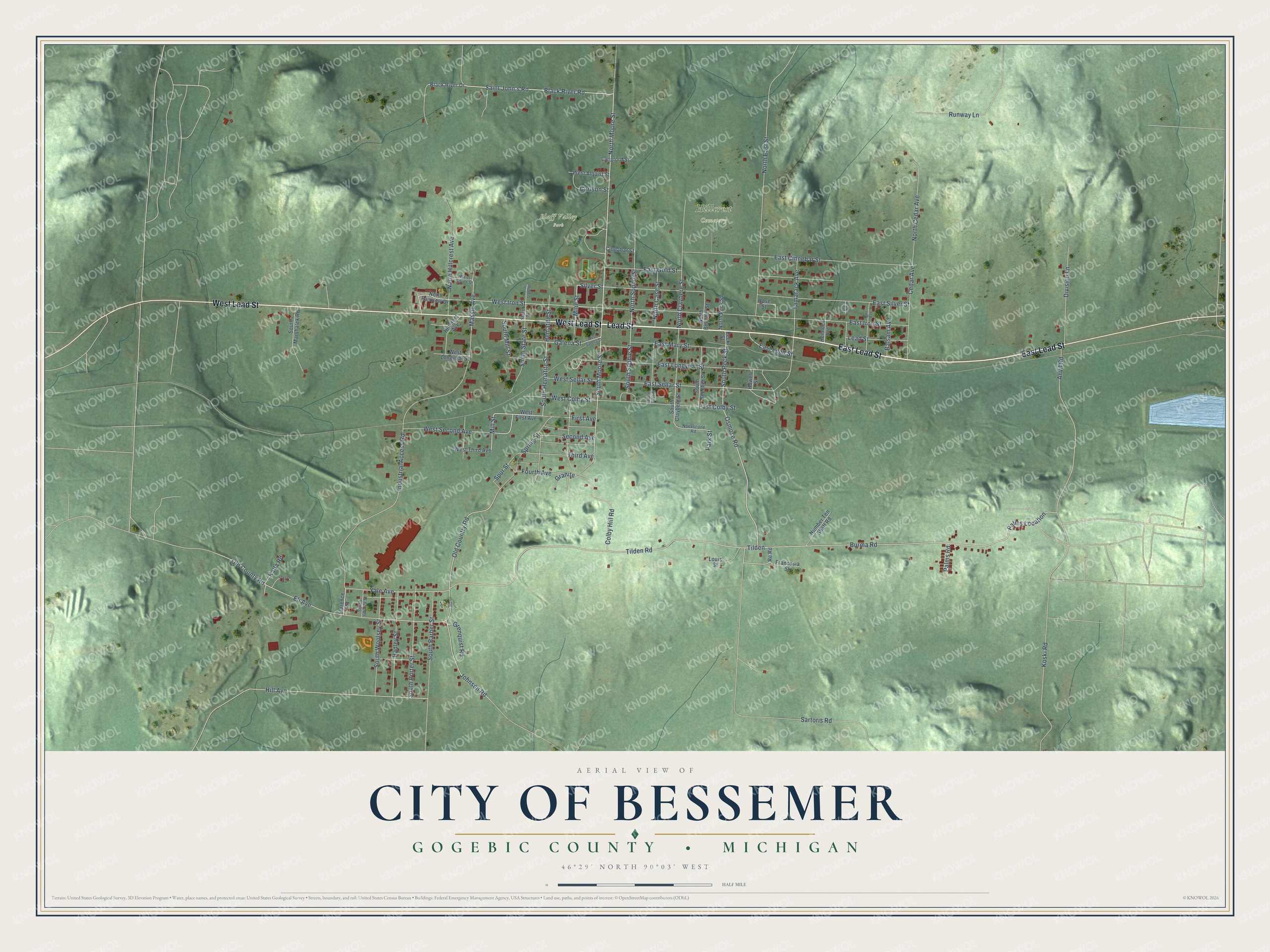 Full map of Bessemer, Michigan, with red buildings, printed street names and the land around them