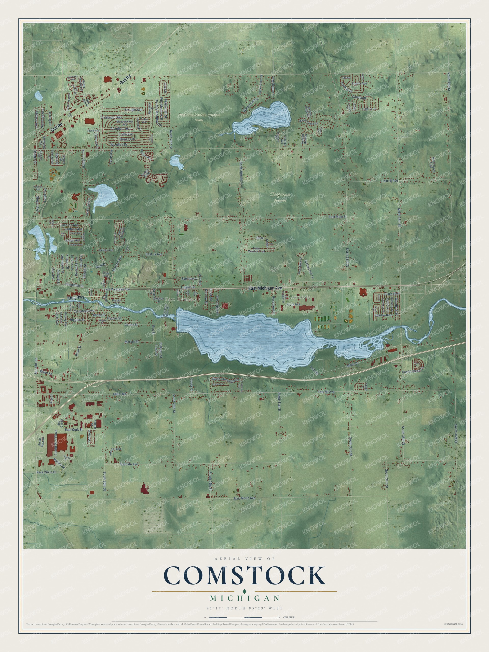 Full map of Comstock, Michigan, with red buildings, printed street names and the land around them