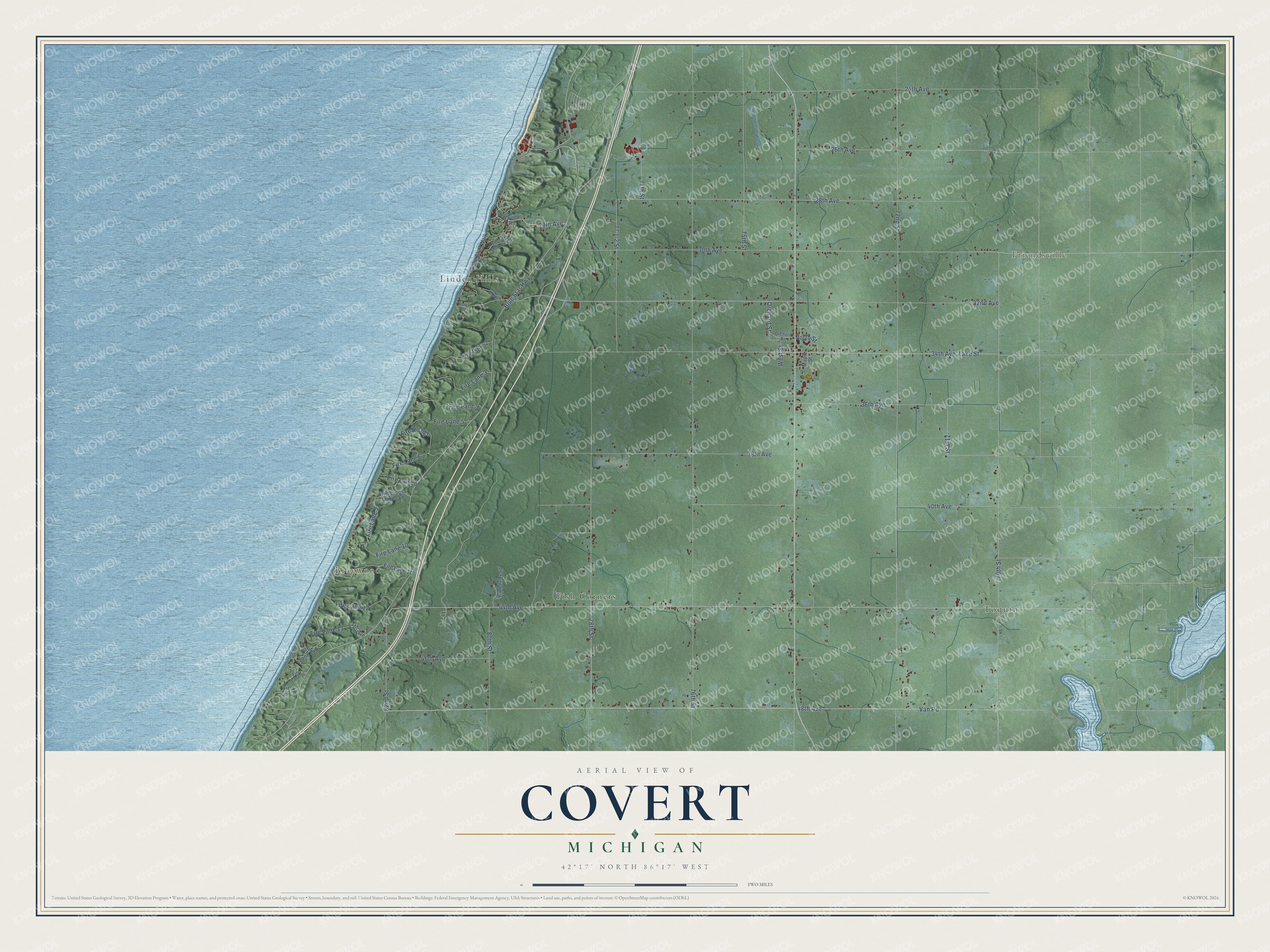 Full map of Covert, Michigan, with red buildings, printed street names and the land around them