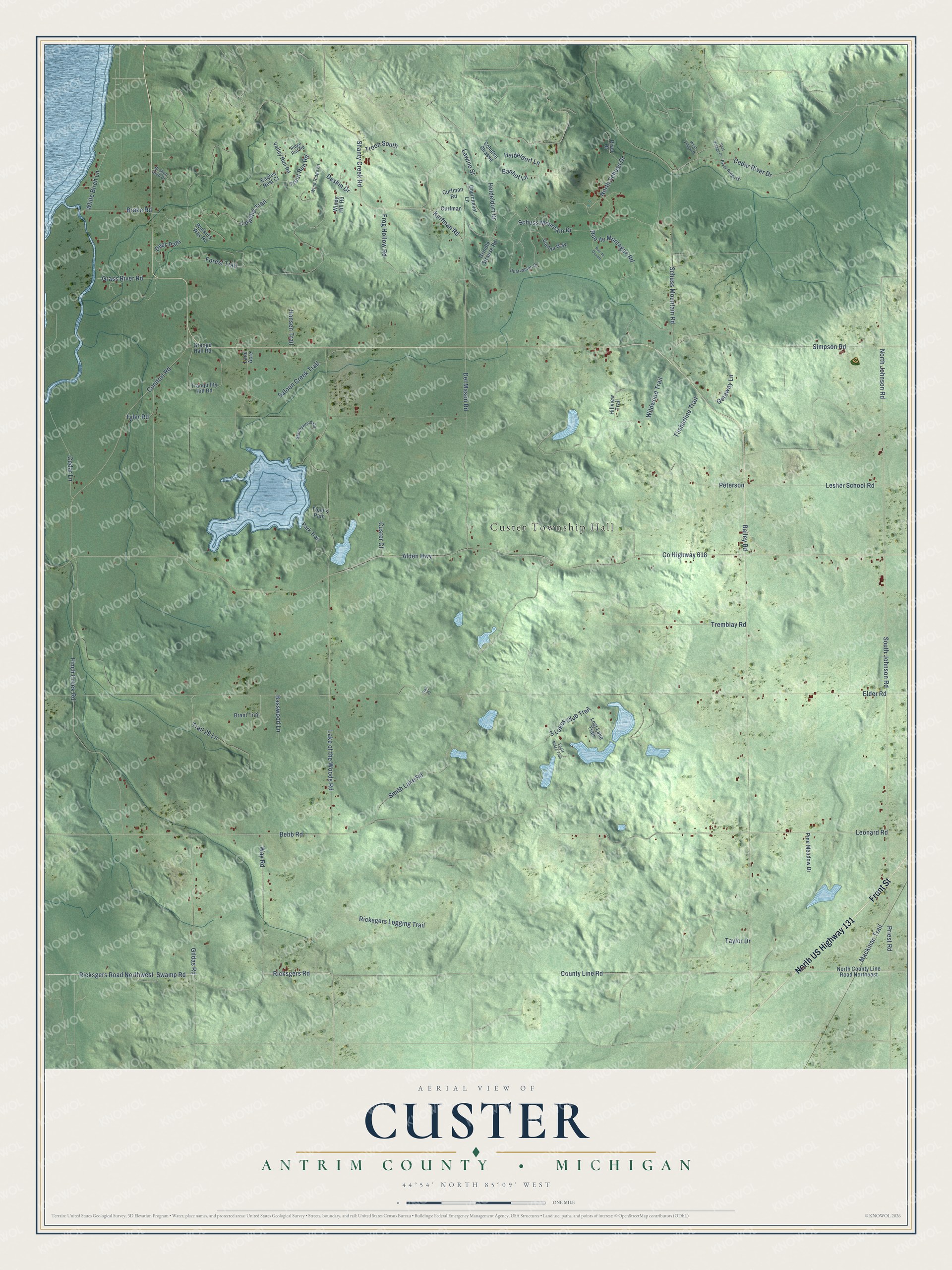 Full map of Custer, Michigan, with red buildings, printed street names and the land around them