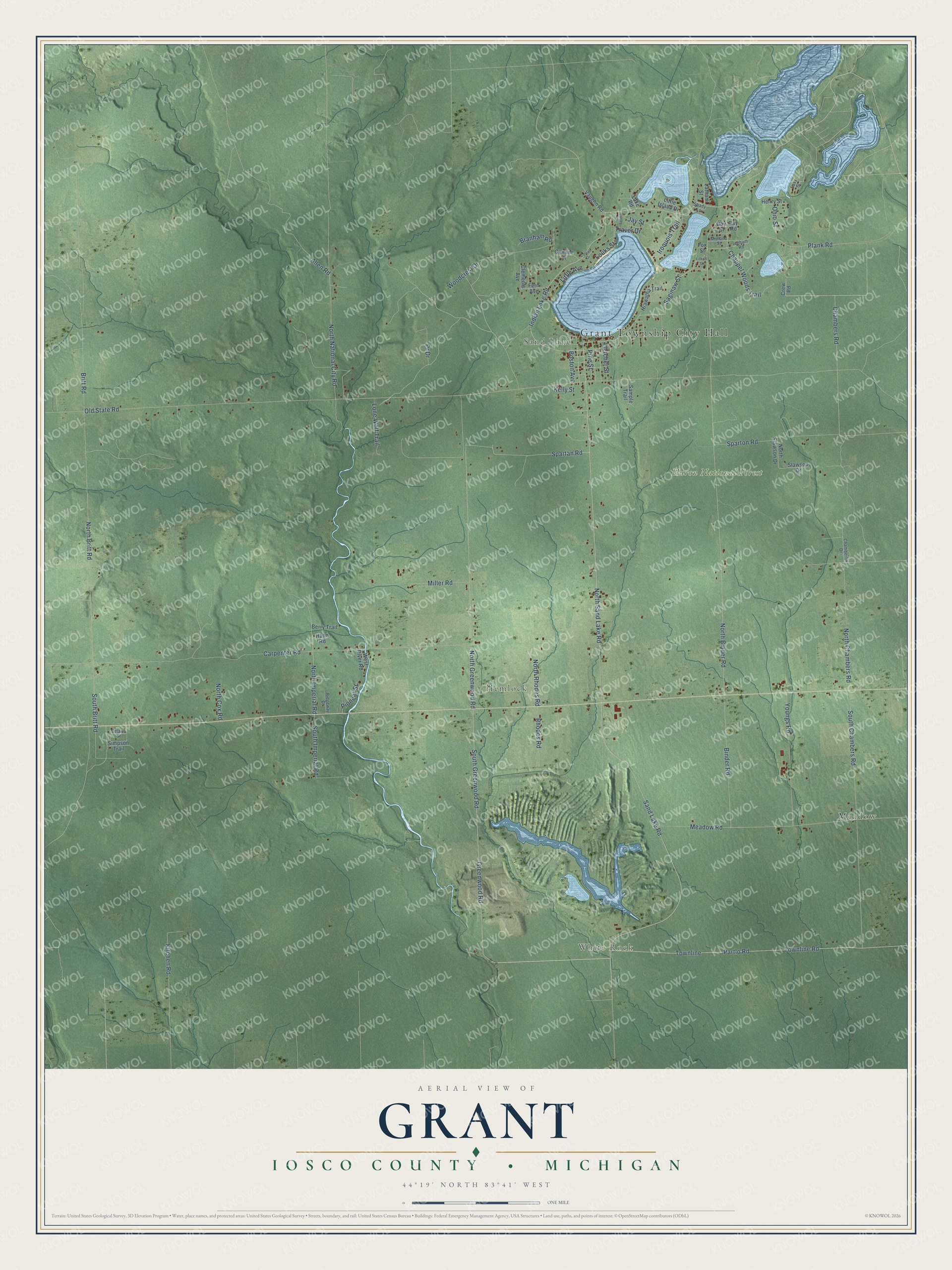 Full map of Grant, Michigan, with red buildings, printed street names and the land around them