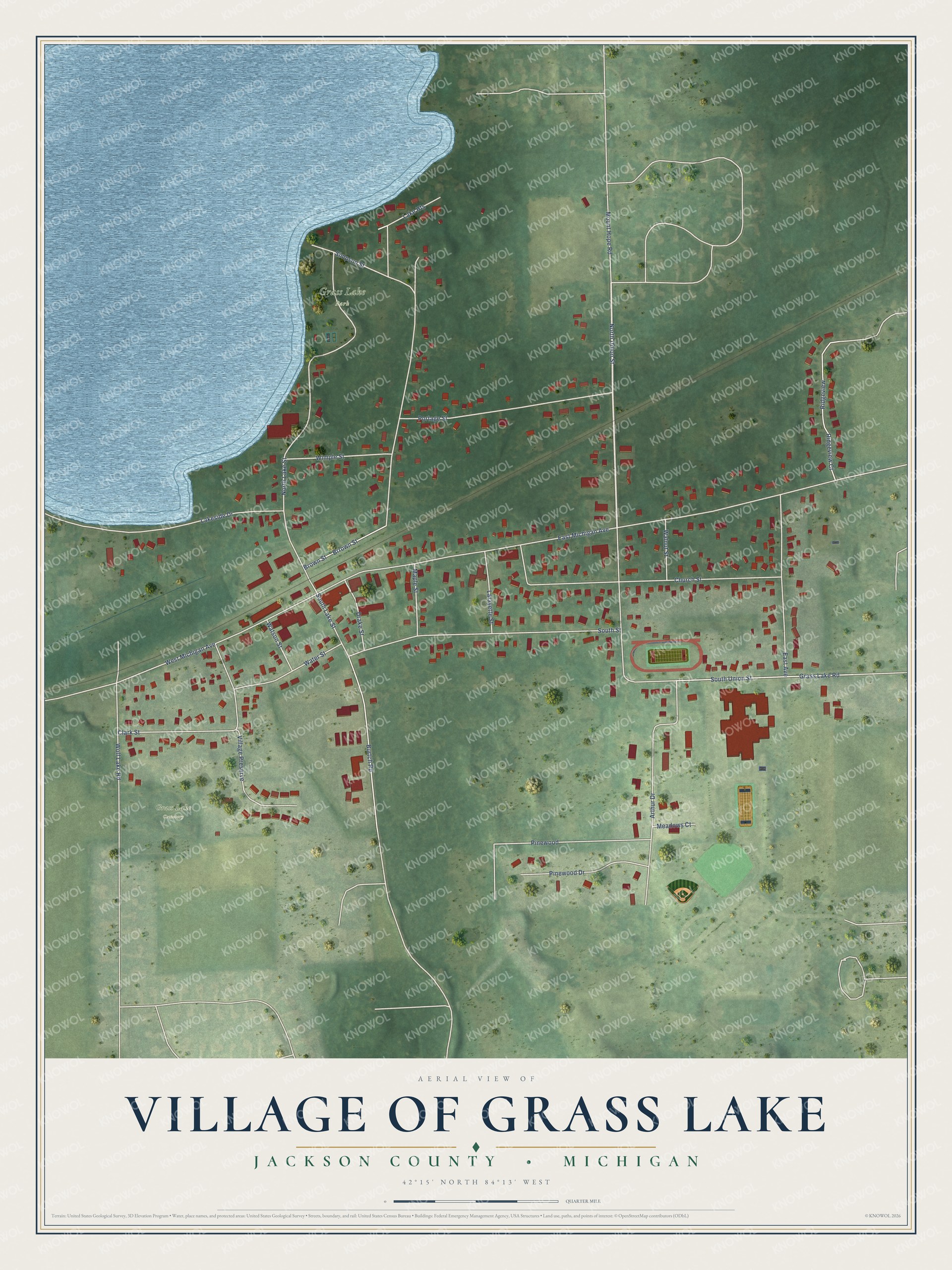 Full map of Grass Lake, Michigan, with red buildings, printed street names and the land around them