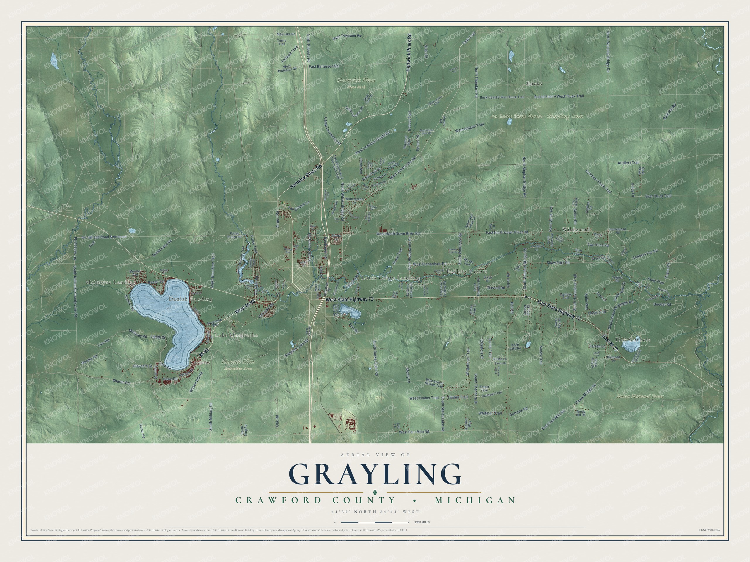 Full map of Grayling, Michigan, with red buildings, printed street names and the land around them