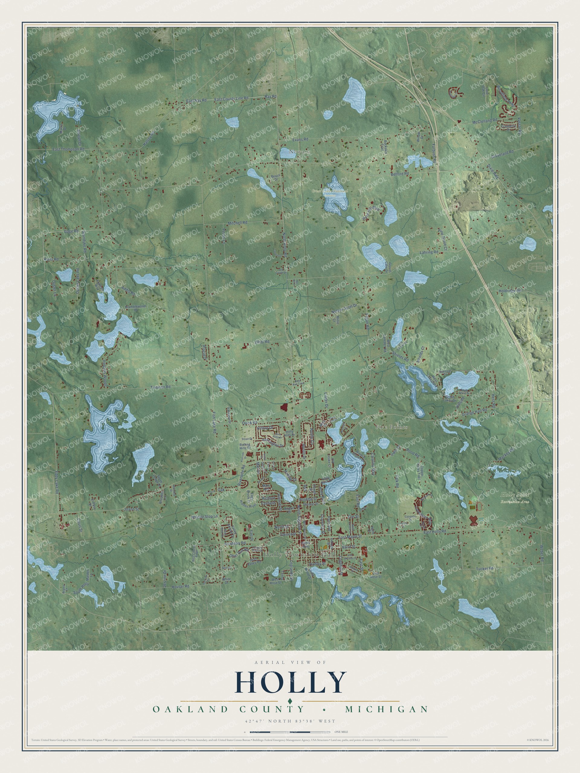 Full map of Holly, Michigan, with red buildings, printed street names and the land around them