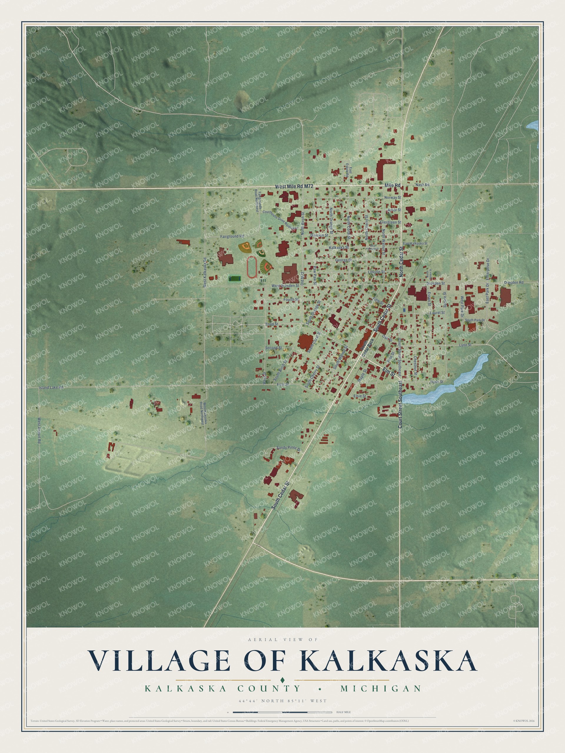 Full map of Kalkaska, Michigan, with red buildings, printed street names and the land around them