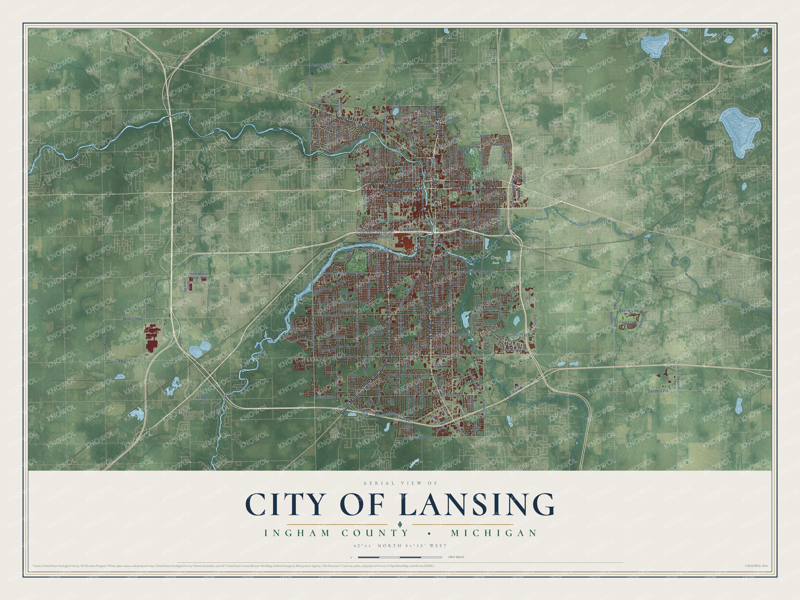Full map of Lansing, Michigan, with red buildings, printed street names and the land around them