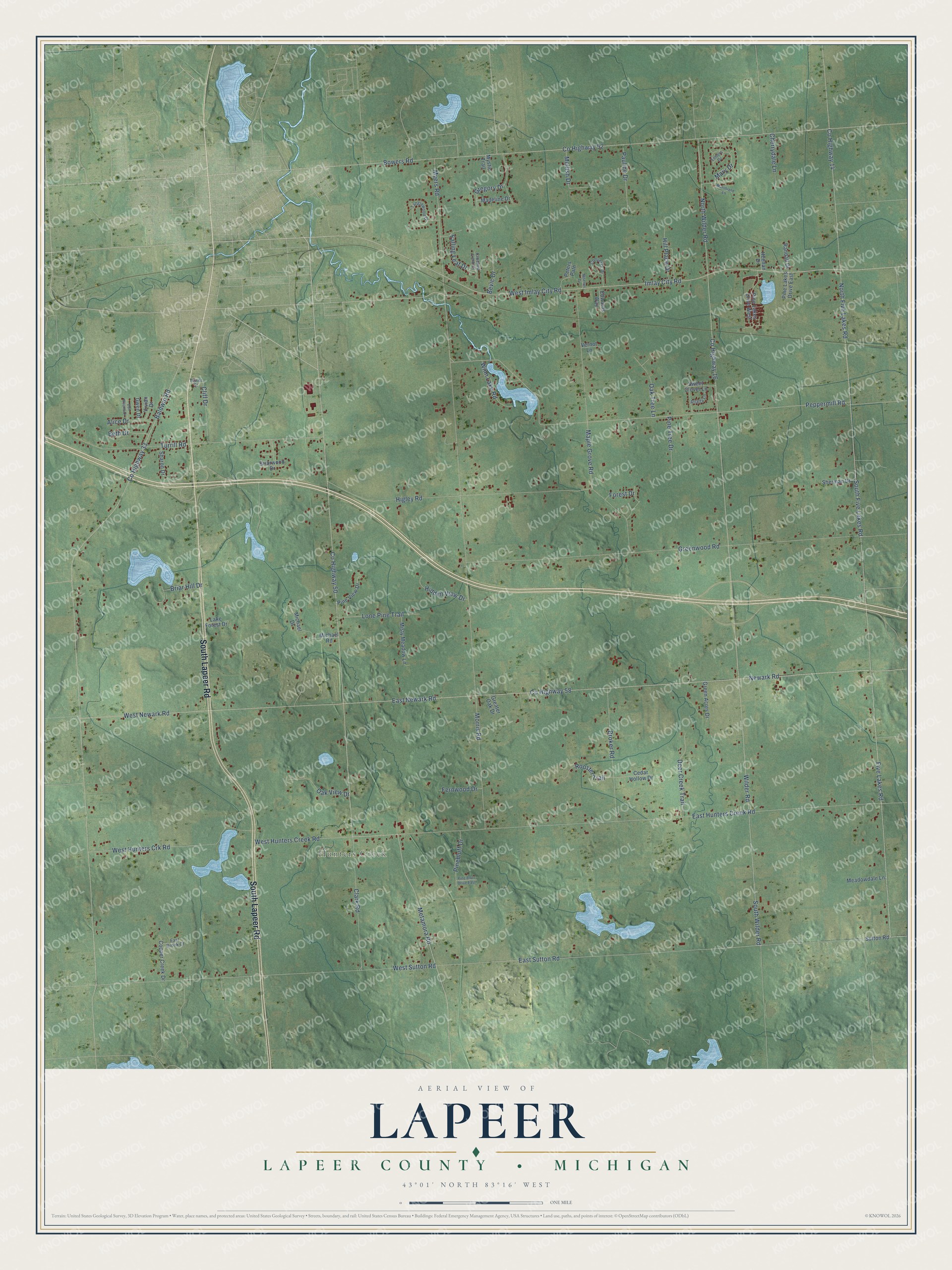 Full map of Lapeer, Michigan, with red buildings, printed street names and the land around them