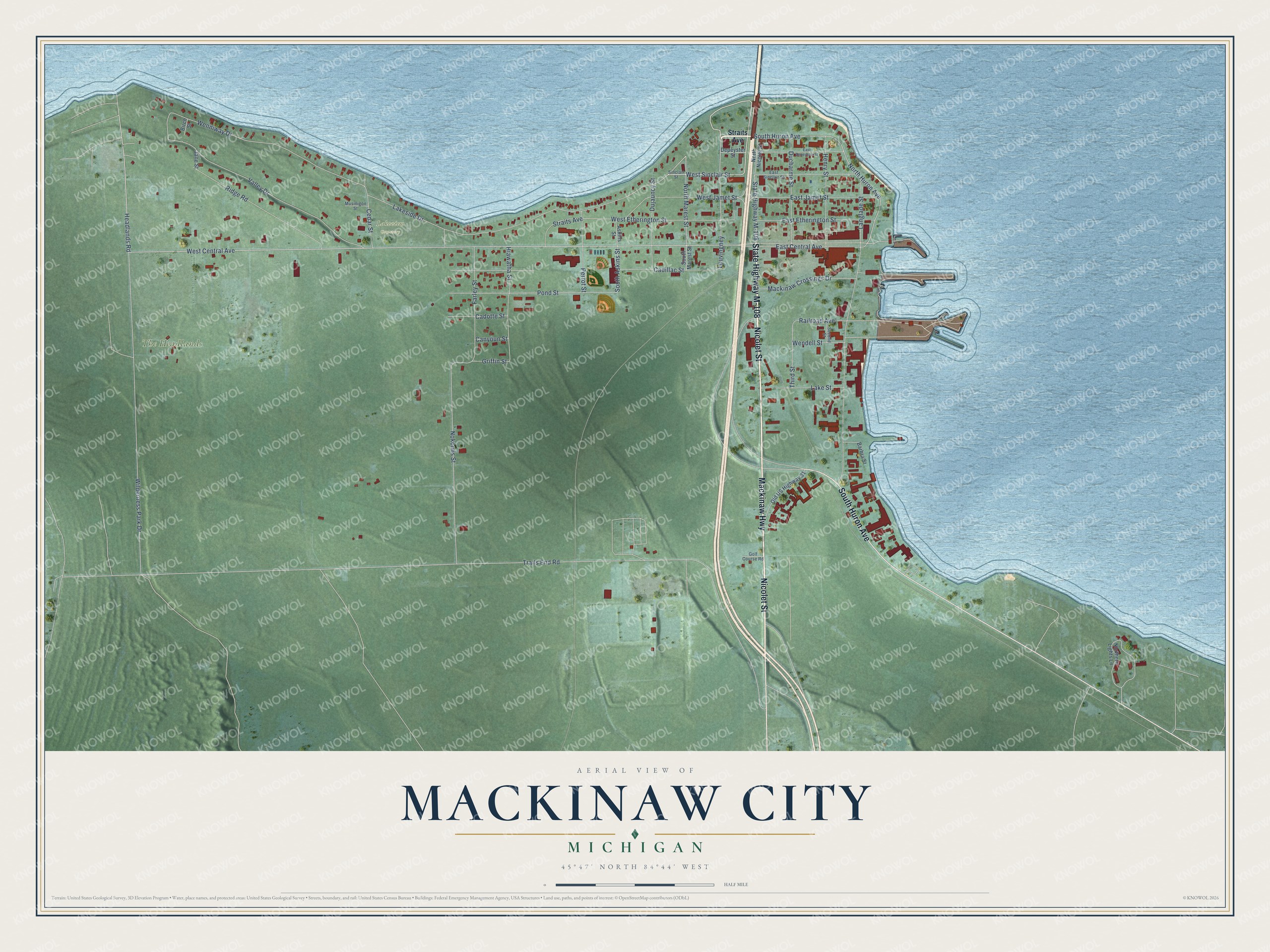 Full map of Mackinaw City, Michigan, with red buildings, printed street names and the land around them
