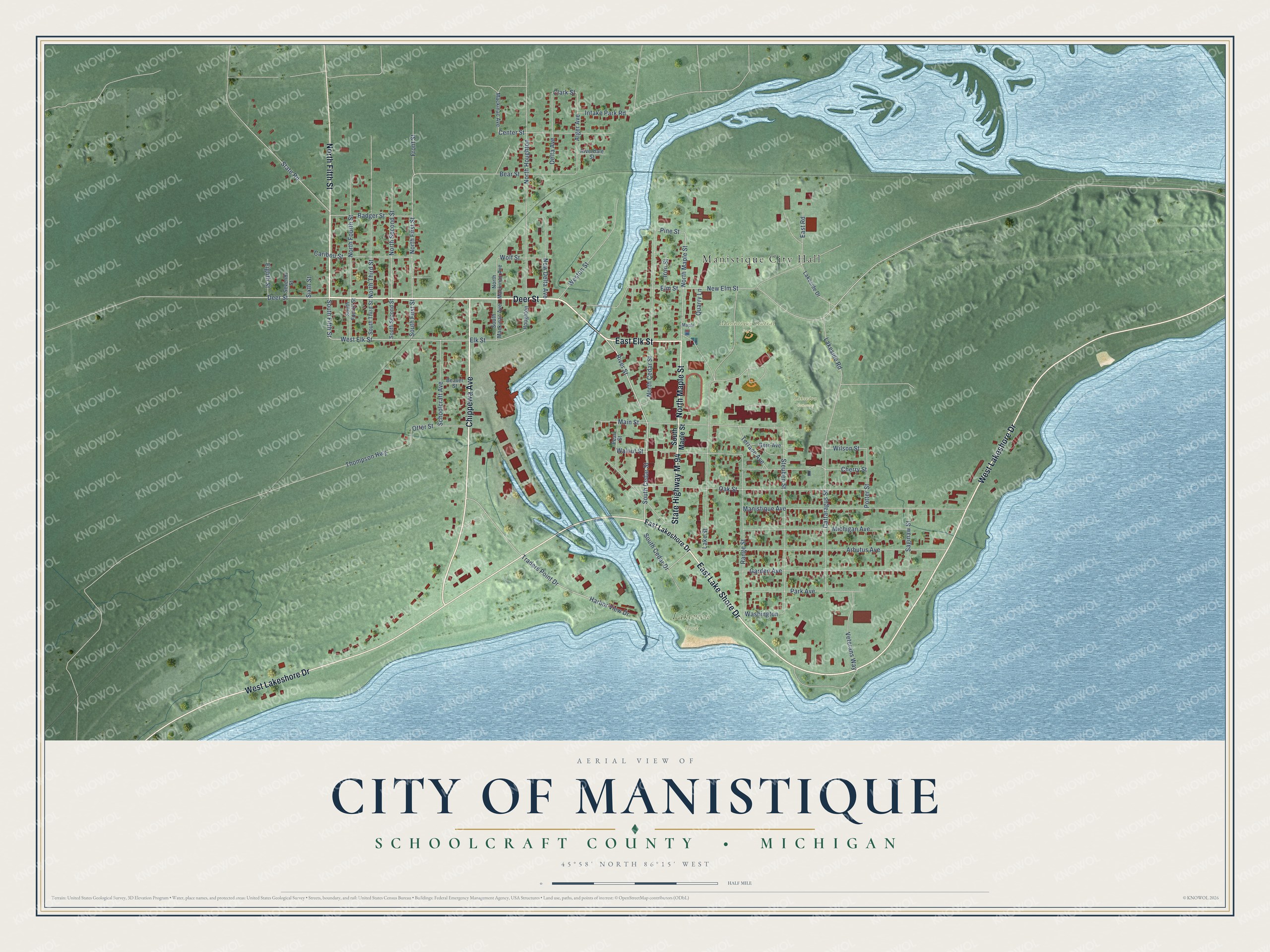 Full map of Manistique, Michigan, with red buildings, printed street names and the land around them