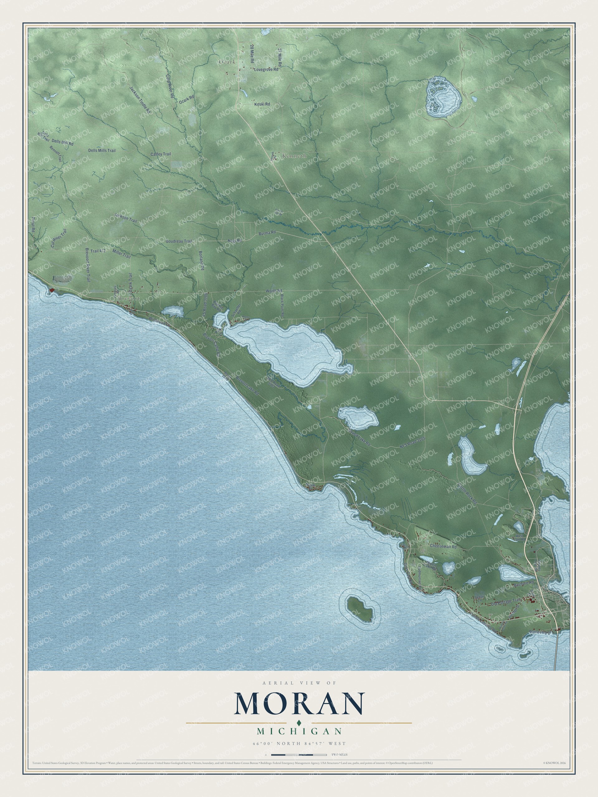 Full map of Moran, Michigan, with red buildings, printed street names and the land around them