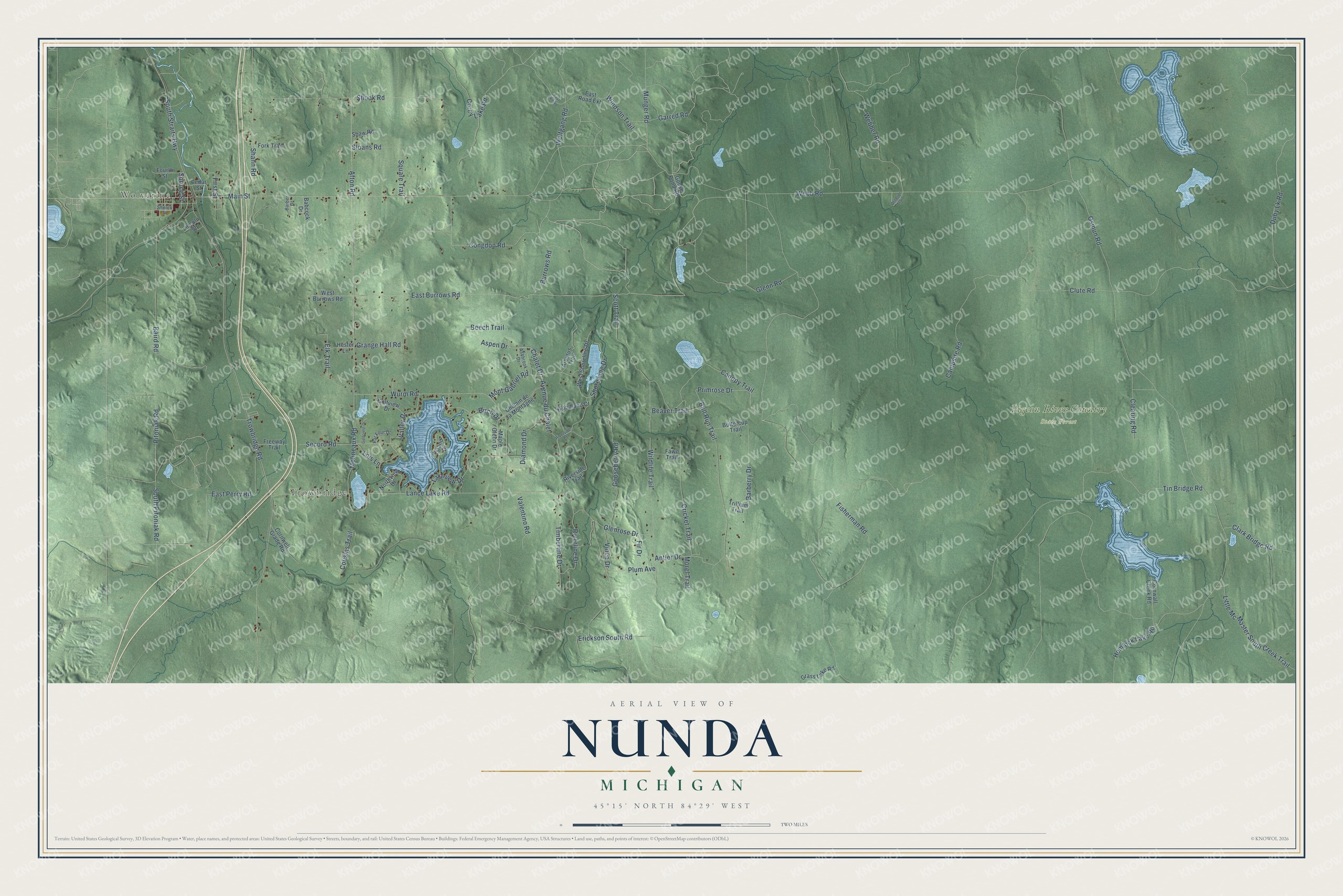 Full map of Nunda, Michigan, with red buildings, printed street names and the land around them