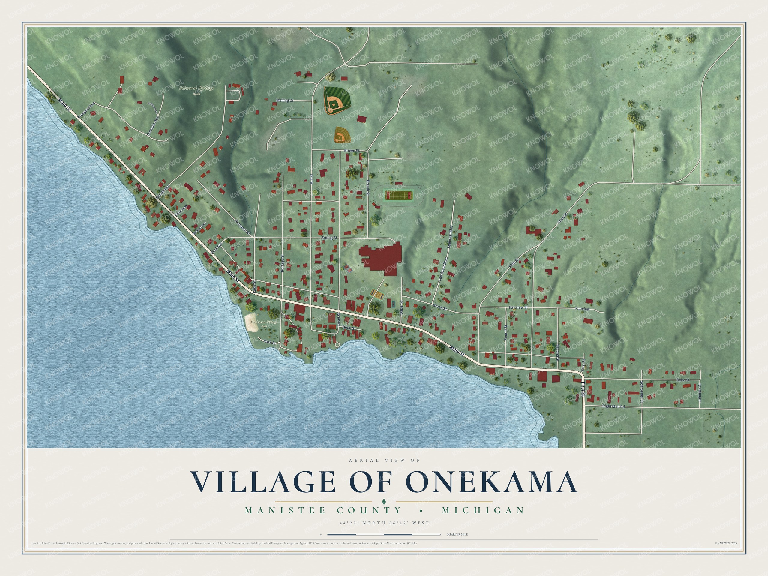Full map of Onekama, Michigan, with red buildings, printed street names and the land around them