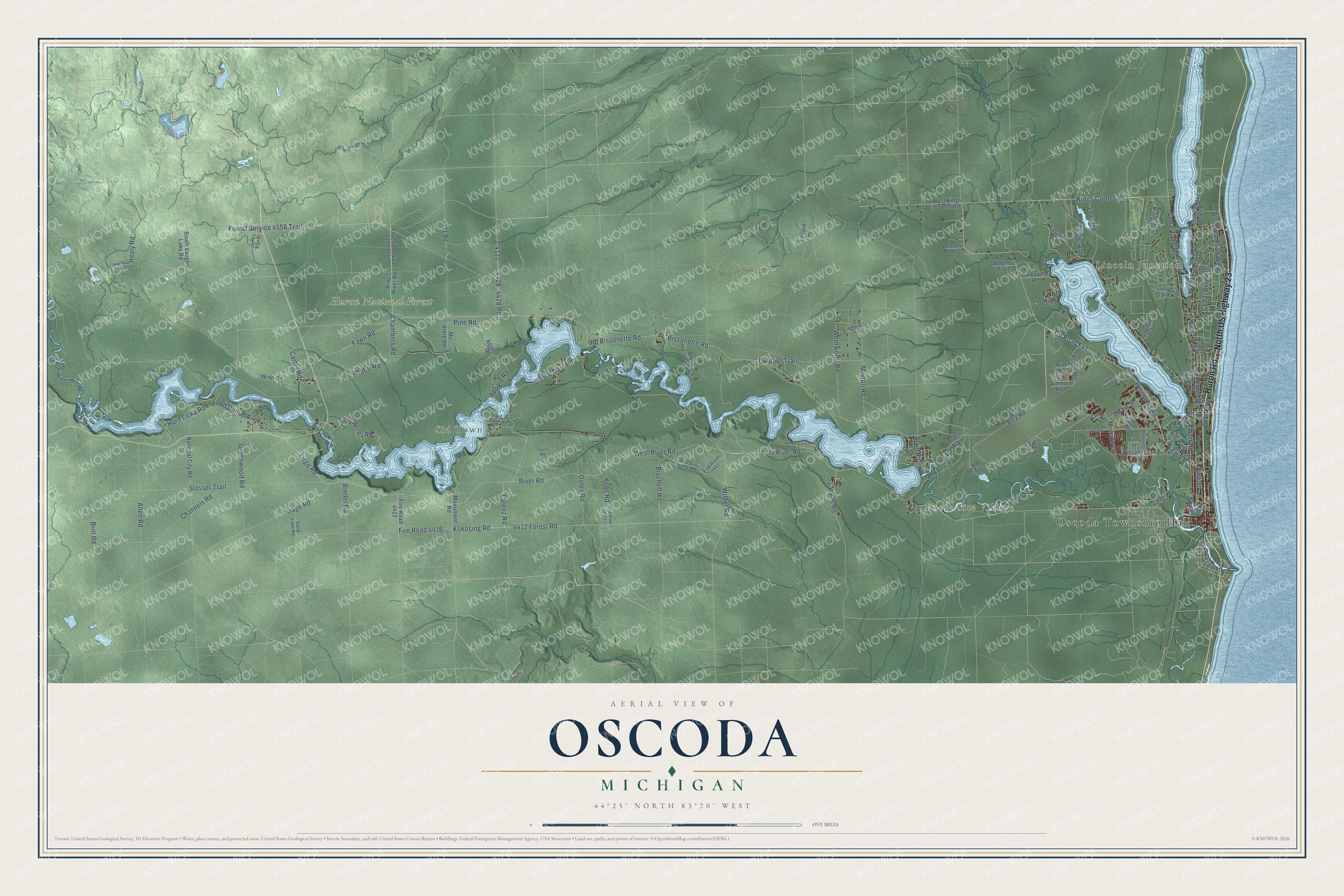 Full map of Oscoda, Michigan, with red buildings, printed street names and the land around them