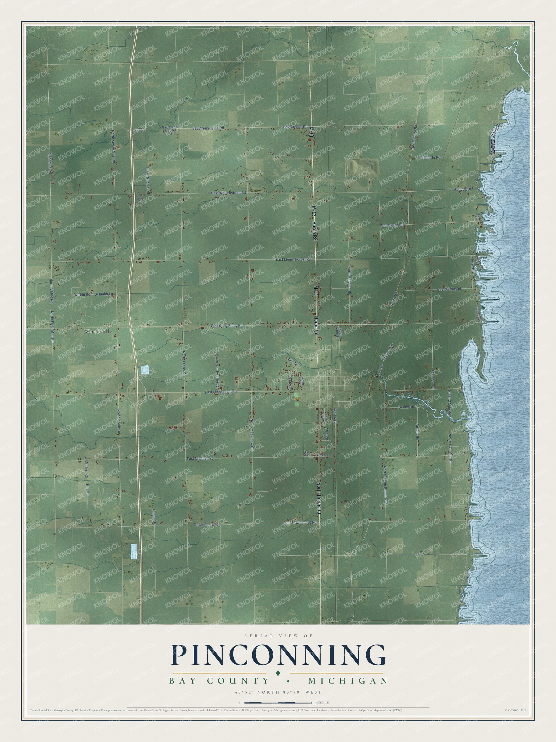 Full map of Pinconning, Michigan, with red buildings, printed street names and the land around them