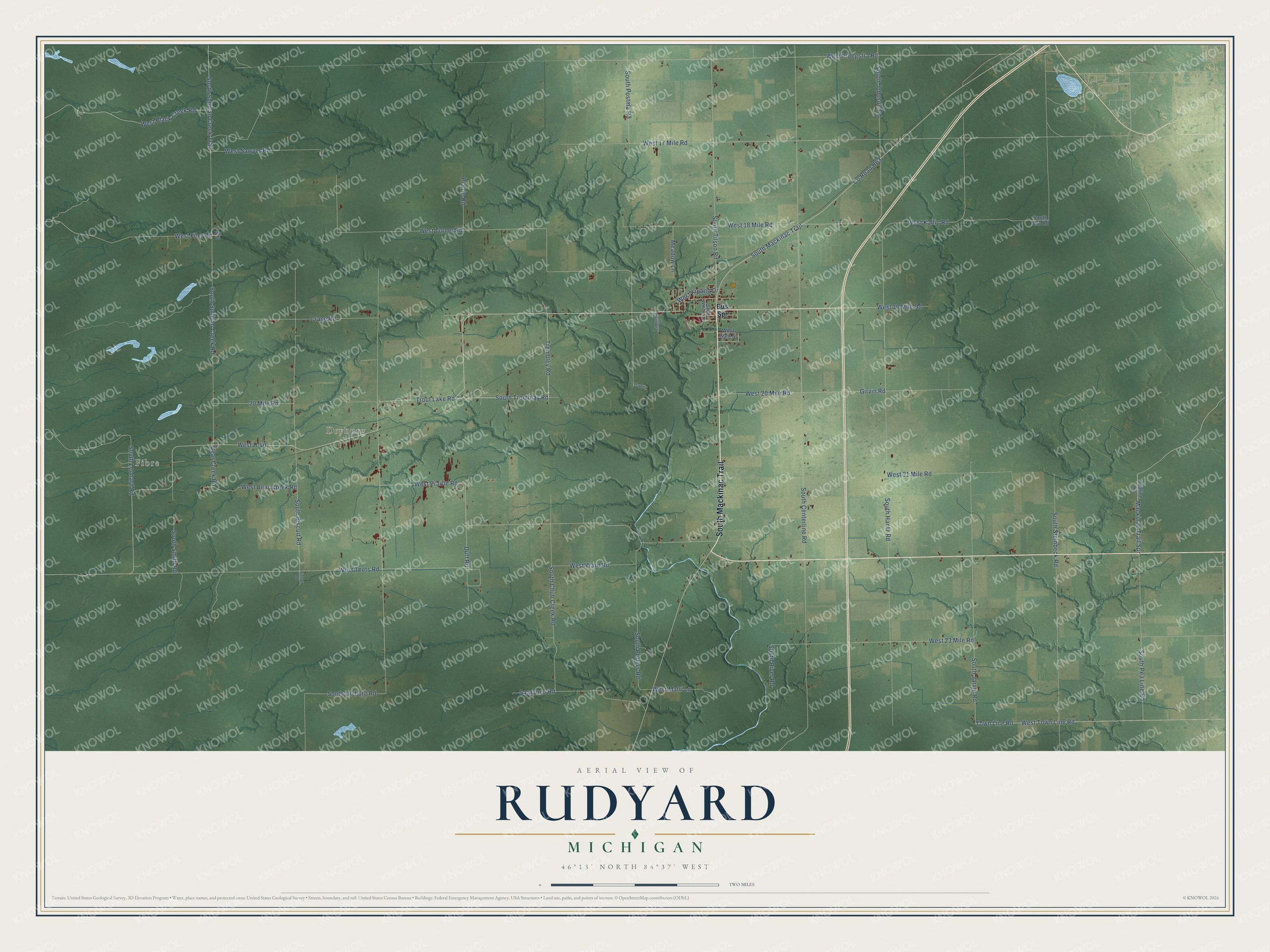 Full map of Rudyard, Michigan, with red buildings, printed street names and the land around them