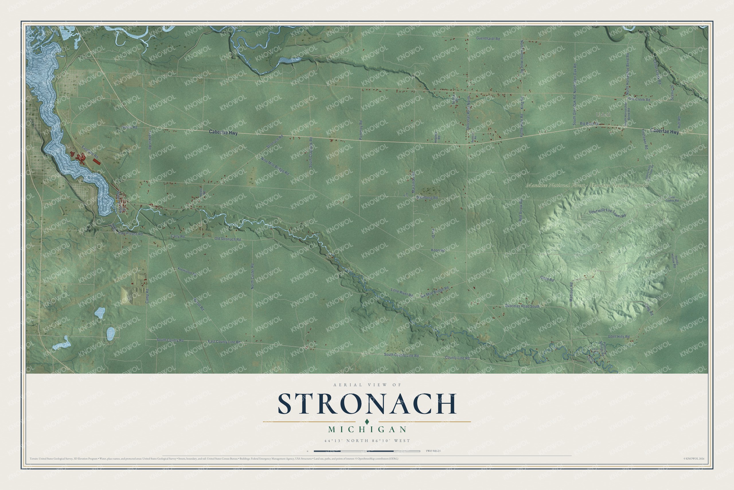 Full map of Stronach, Michigan, with red buildings, printed street names and the land around them