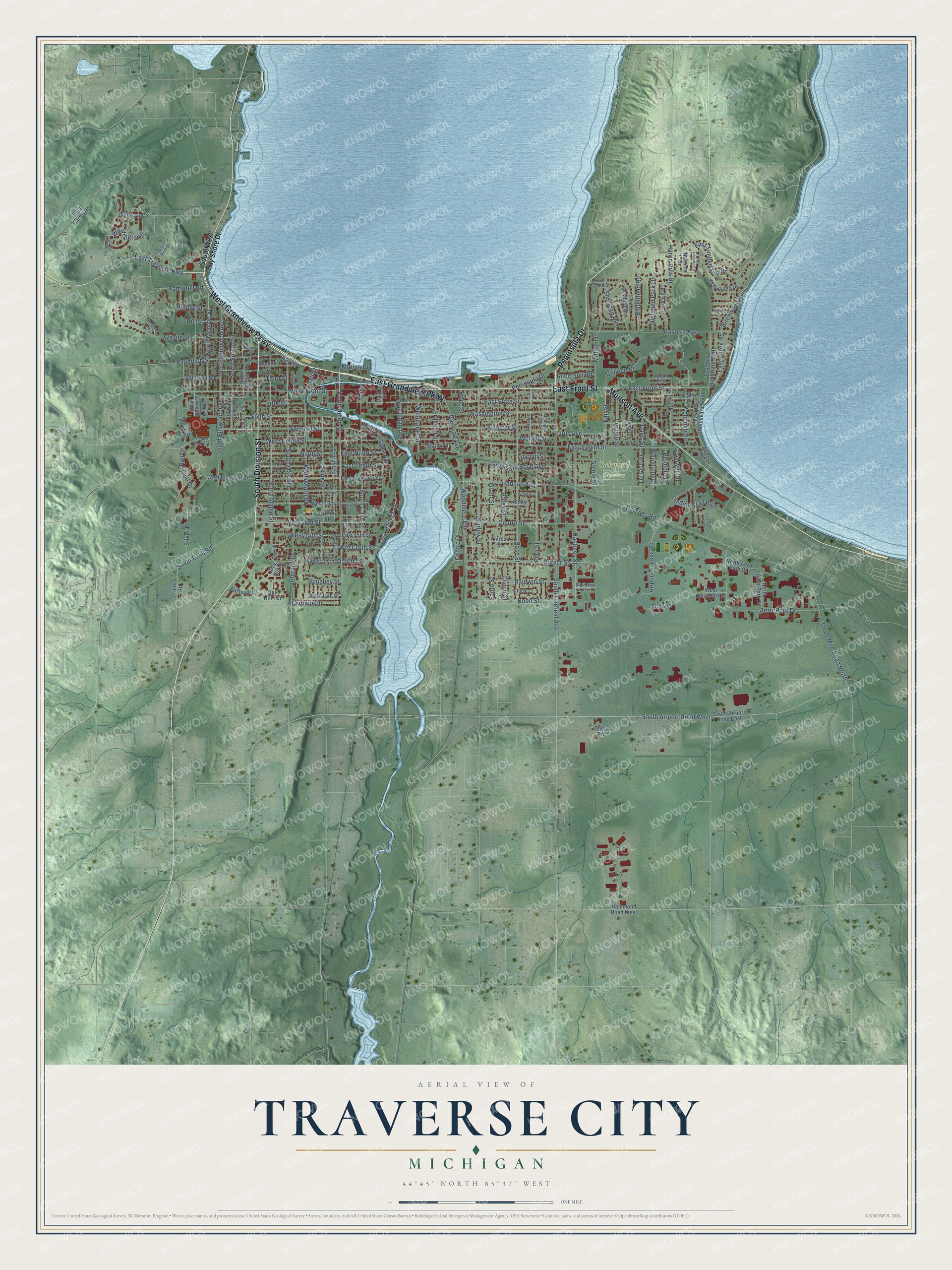 Full map of Traverse City, Michigan, with red buildings, printed street names and the land around them