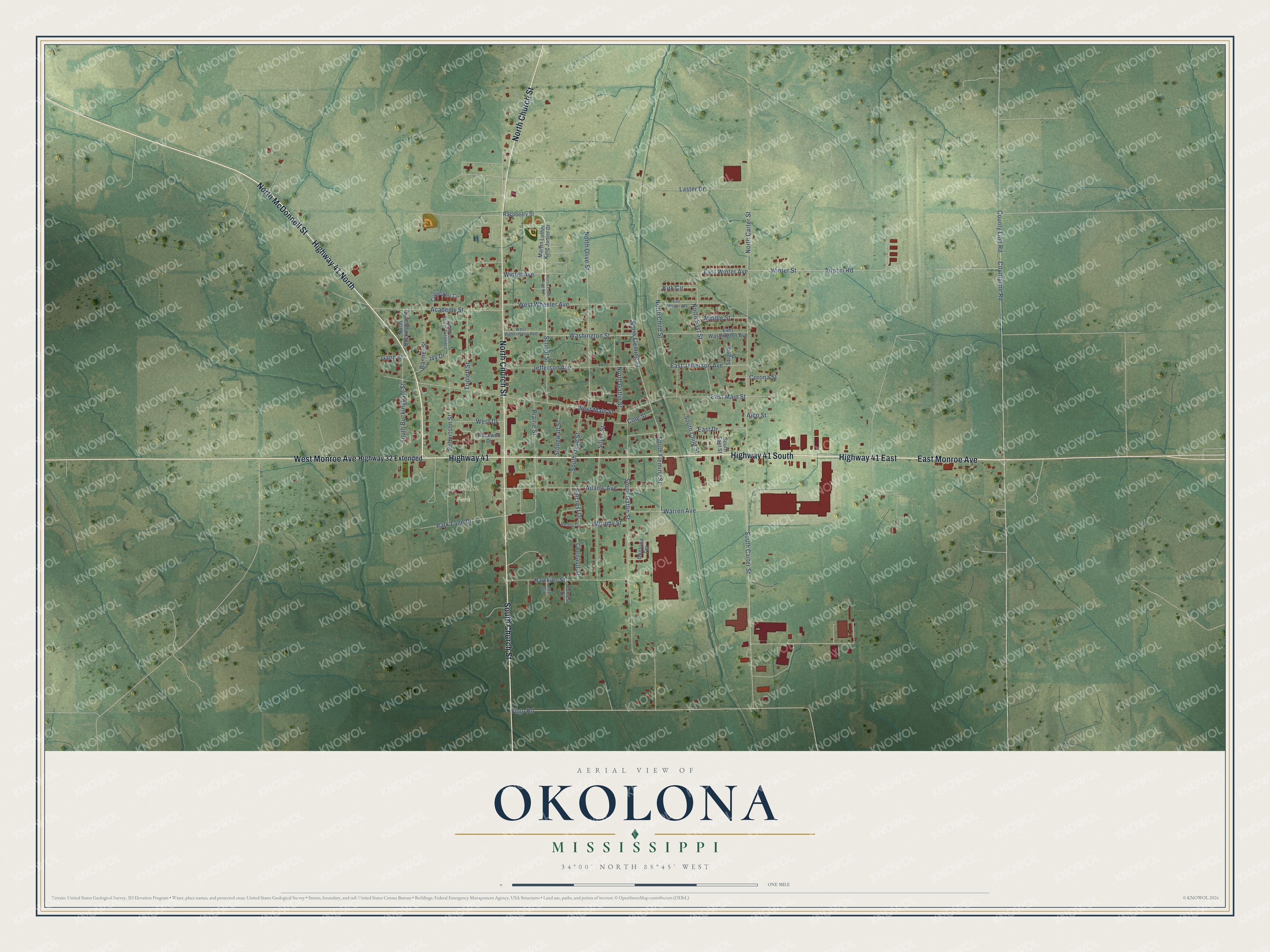 Full map of Okolona, Mississippi, with red buildings, printed street names and the land around them