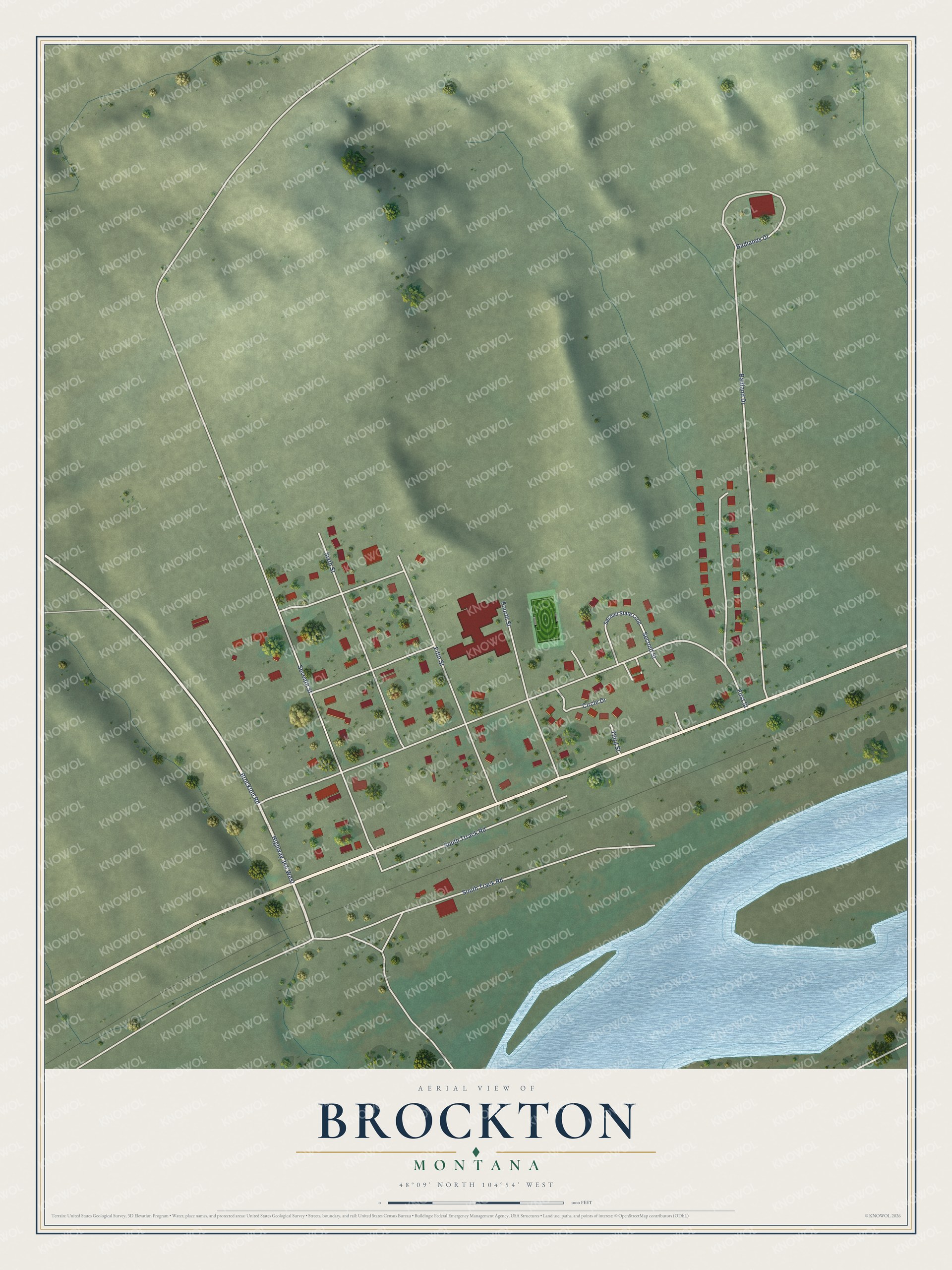 Full map of Brockton, Montana, with red buildings, printed street names and the land around them