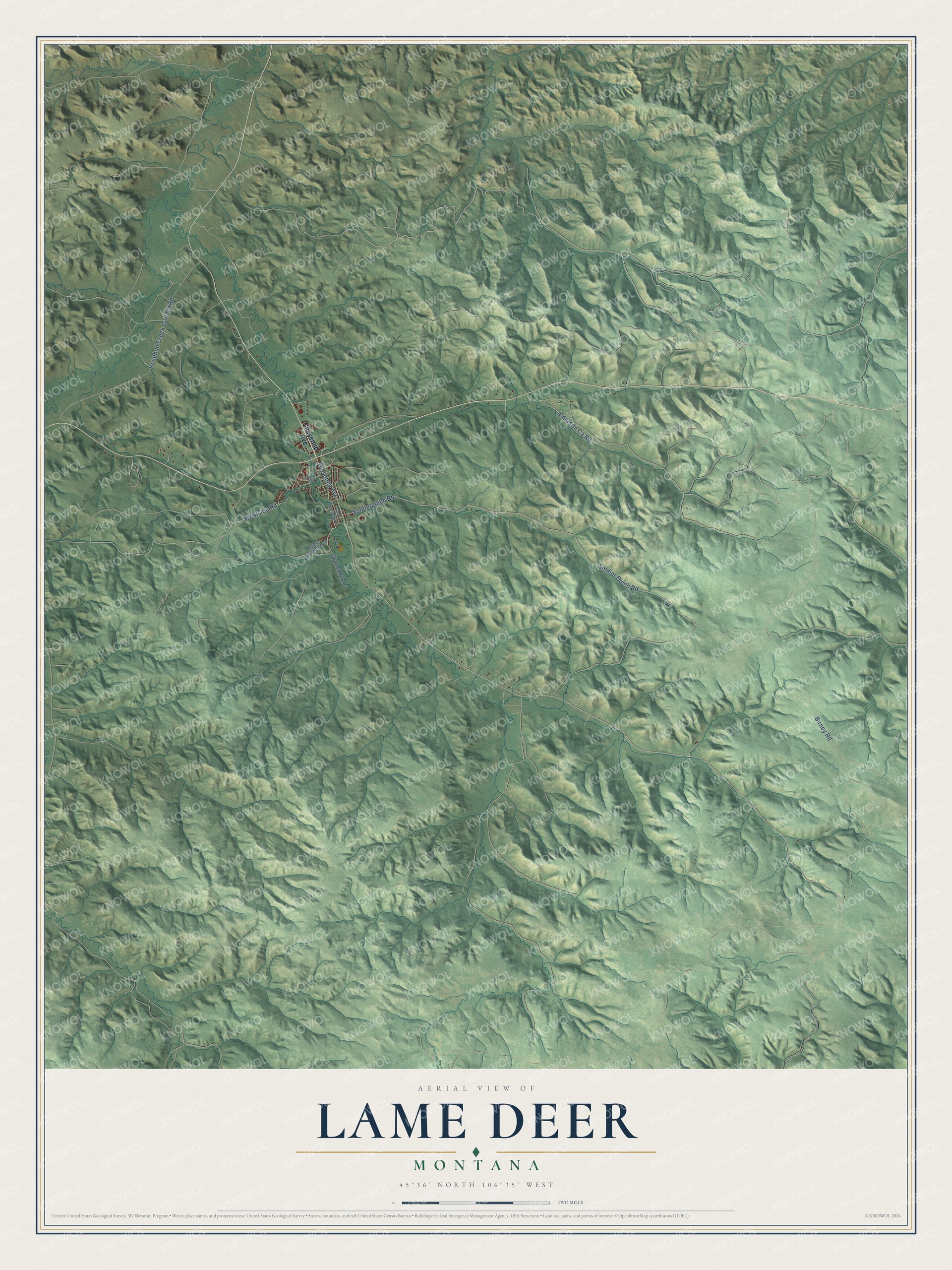 Full map of Lame Deer, Montana, with red buildings, printed street names and the land around them