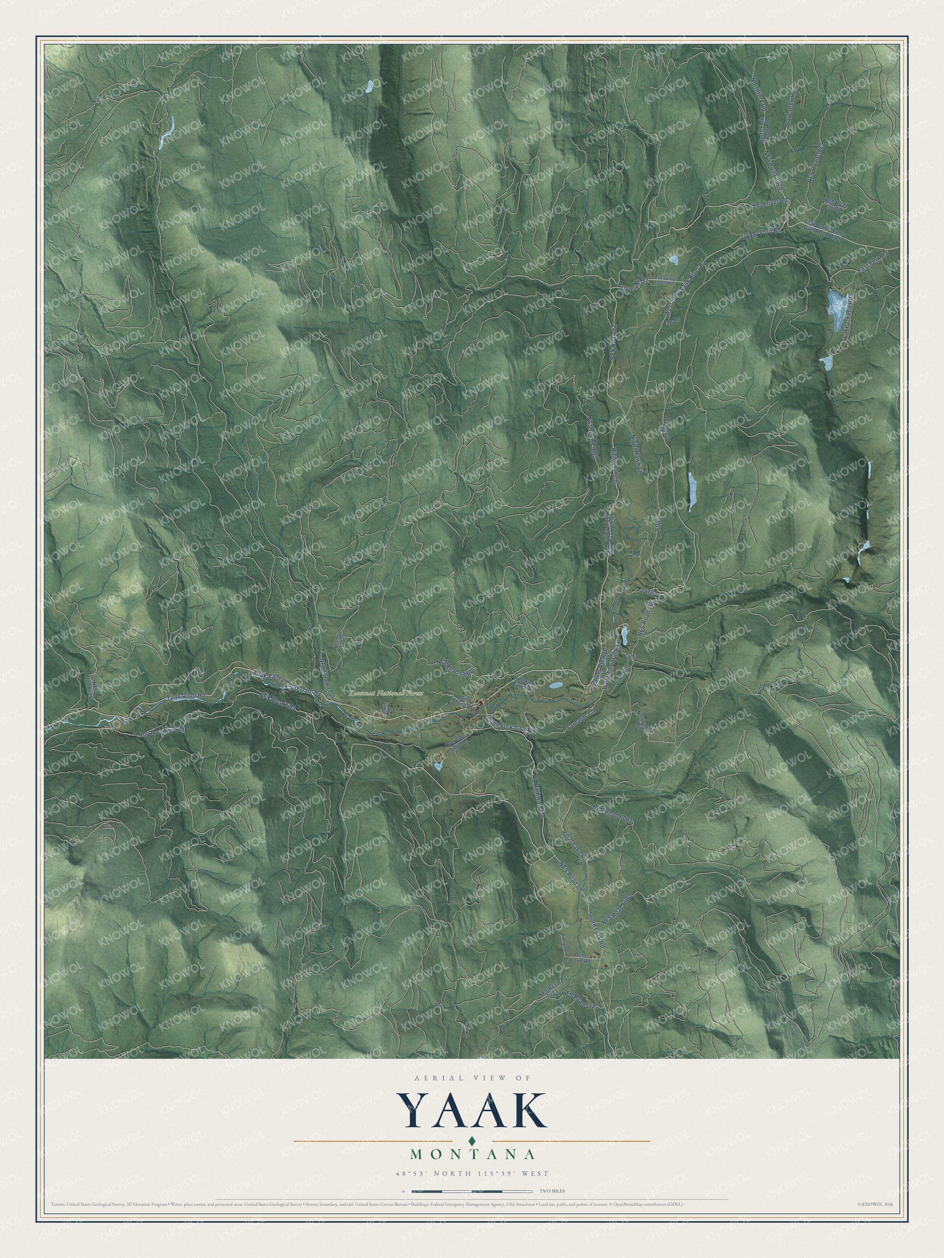 Full map of Yaak, Montana, with red buildings, printed street names and the land around them