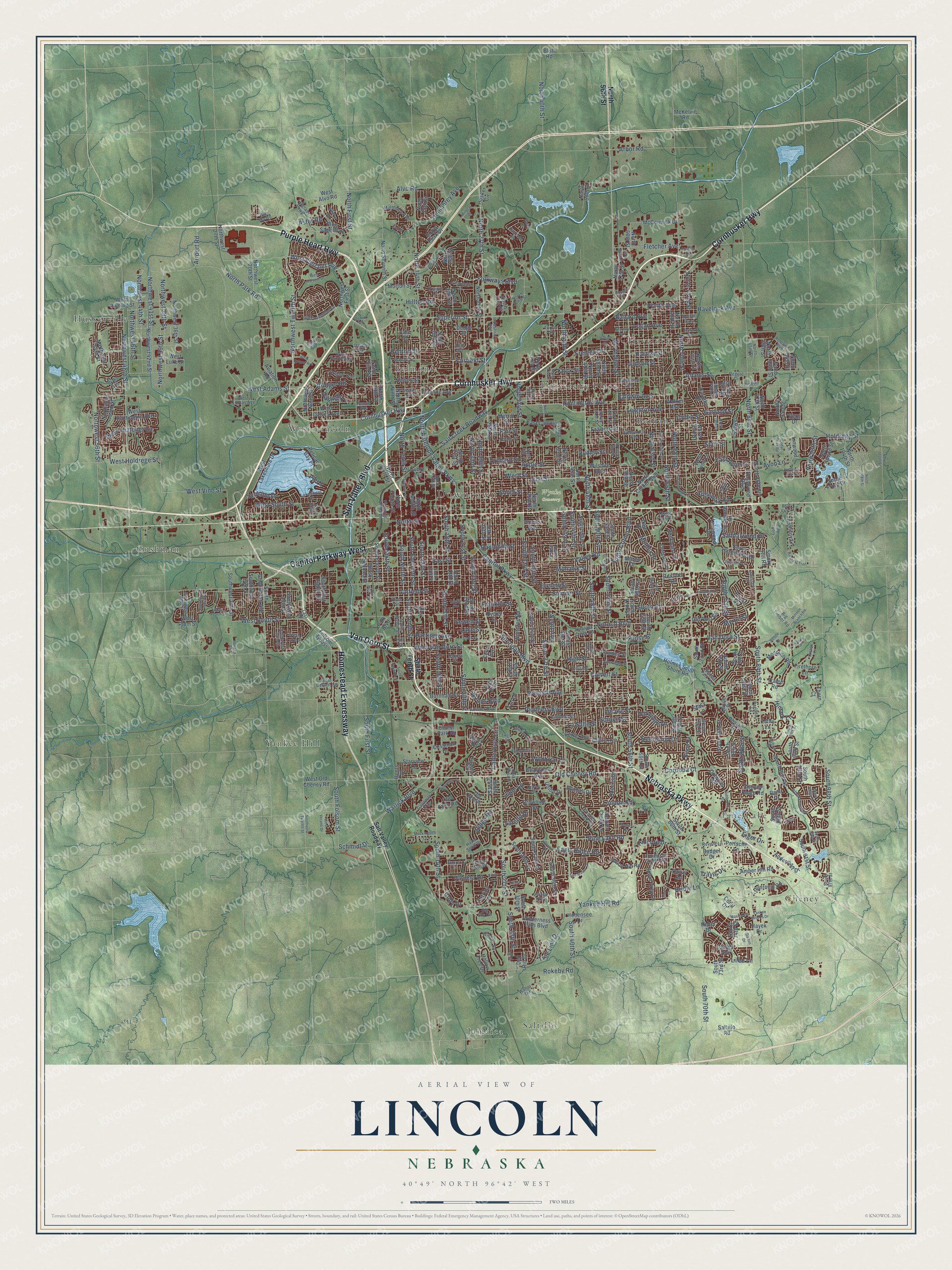 Full map of Lincoln, Nebraska, with red buildings, printed street names and the land around them