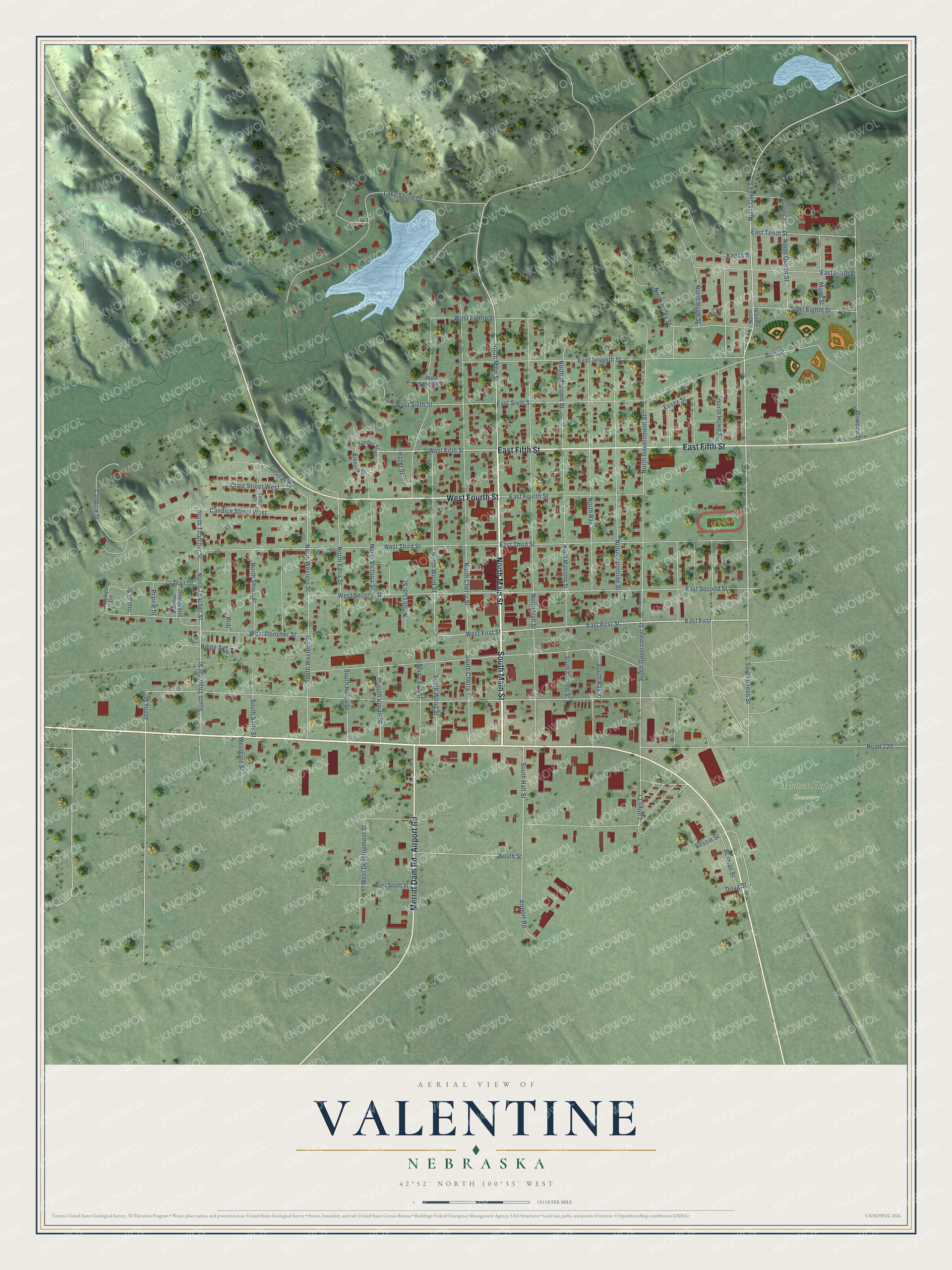 Full map of Valentine, Nebraska, with red buildings, printed street names and the land around them
