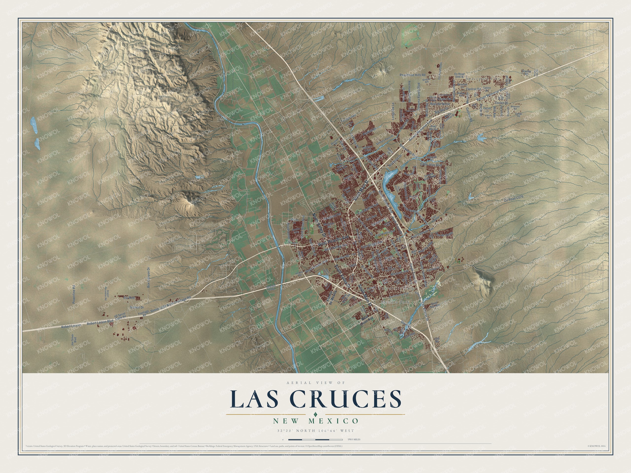 Full map of Las Cruces, New Mexico, with red buildings, printed street names and the land around them